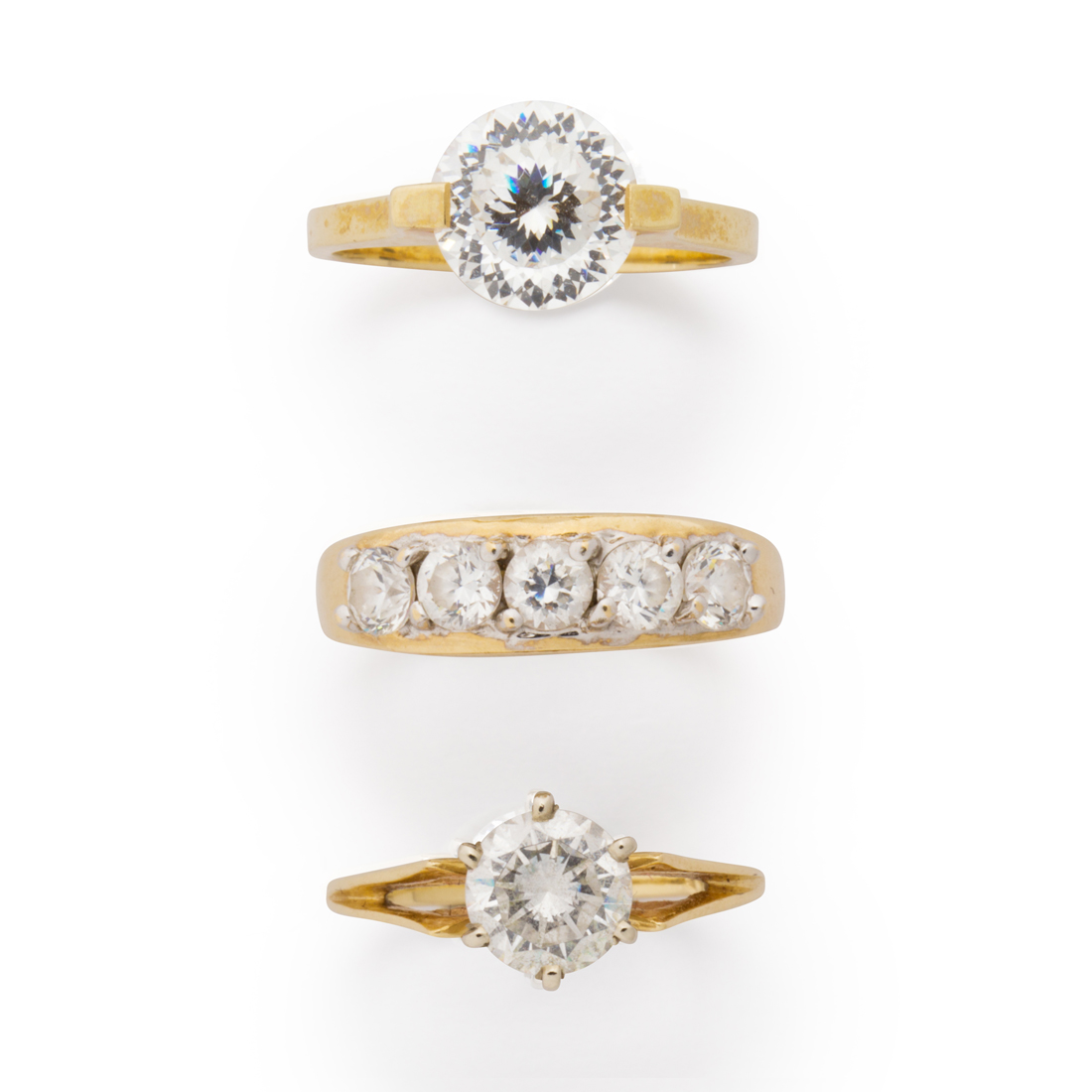 A GROUP OF CZ AND GOLD RINGS A 3a22c6