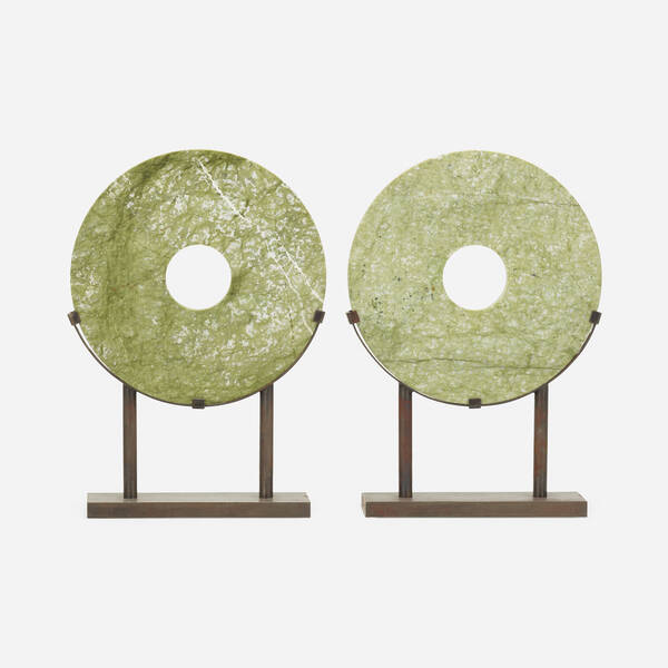 Baker. Discs, pair. 20th century, patinated