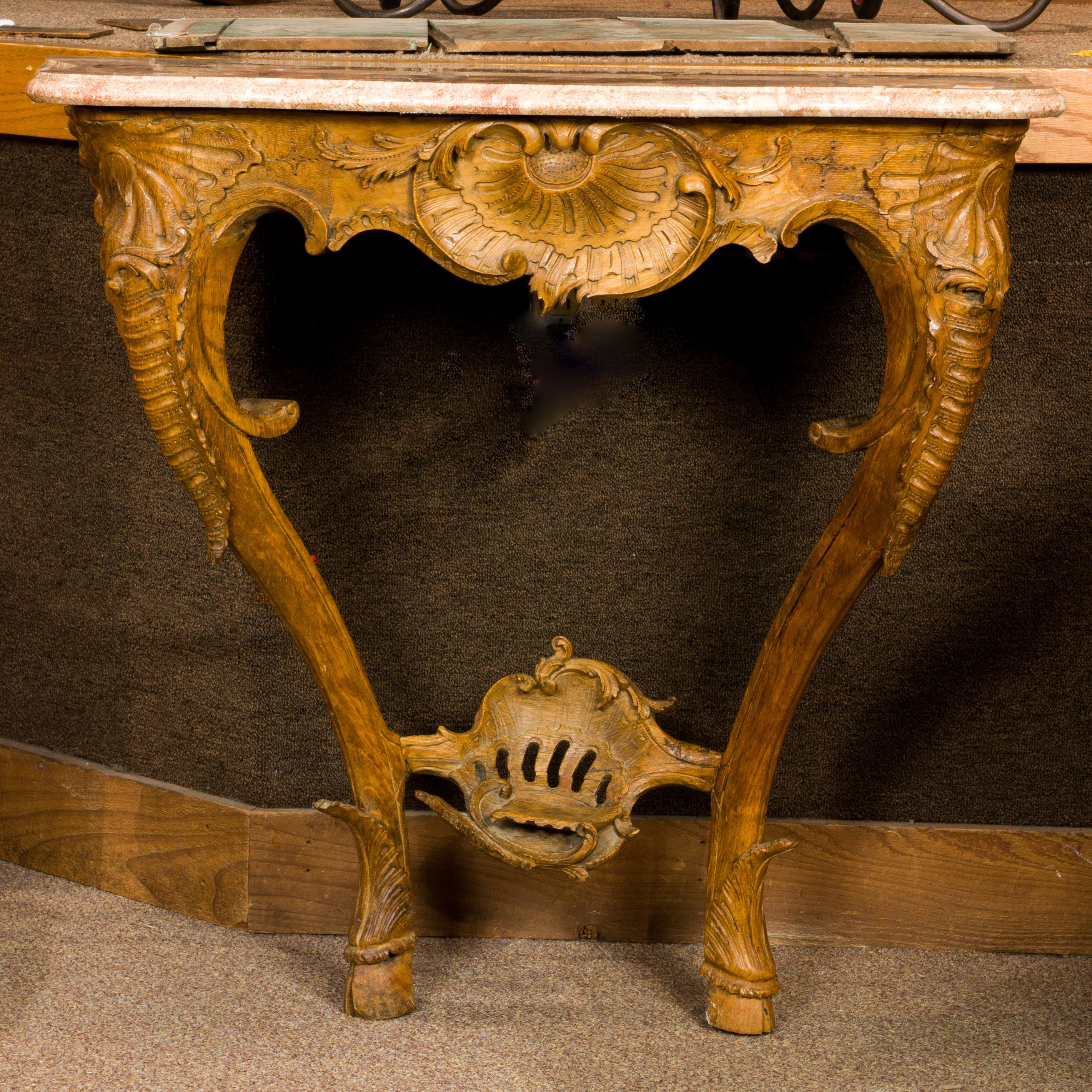 A FRENCH CARVED MARBLE TOP CONSOLE