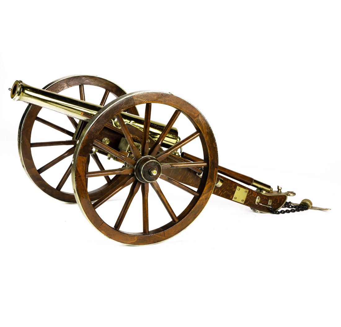 MINIATURE BRASS CANNON ON BRASS MOUNTED