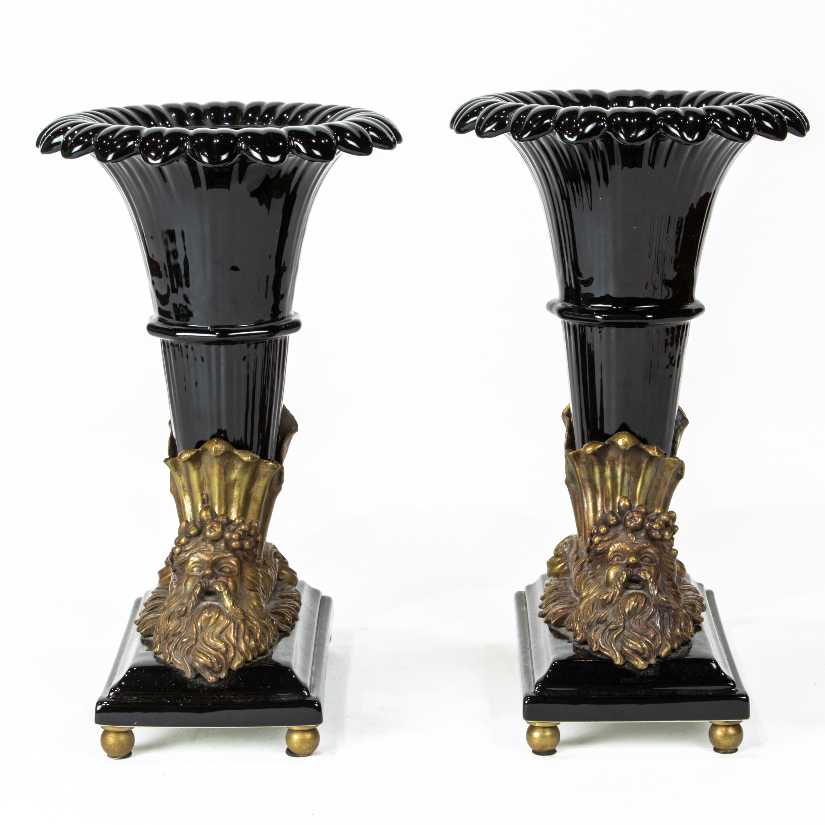 A PAIR OF BRONZE MOUNTED URNS A