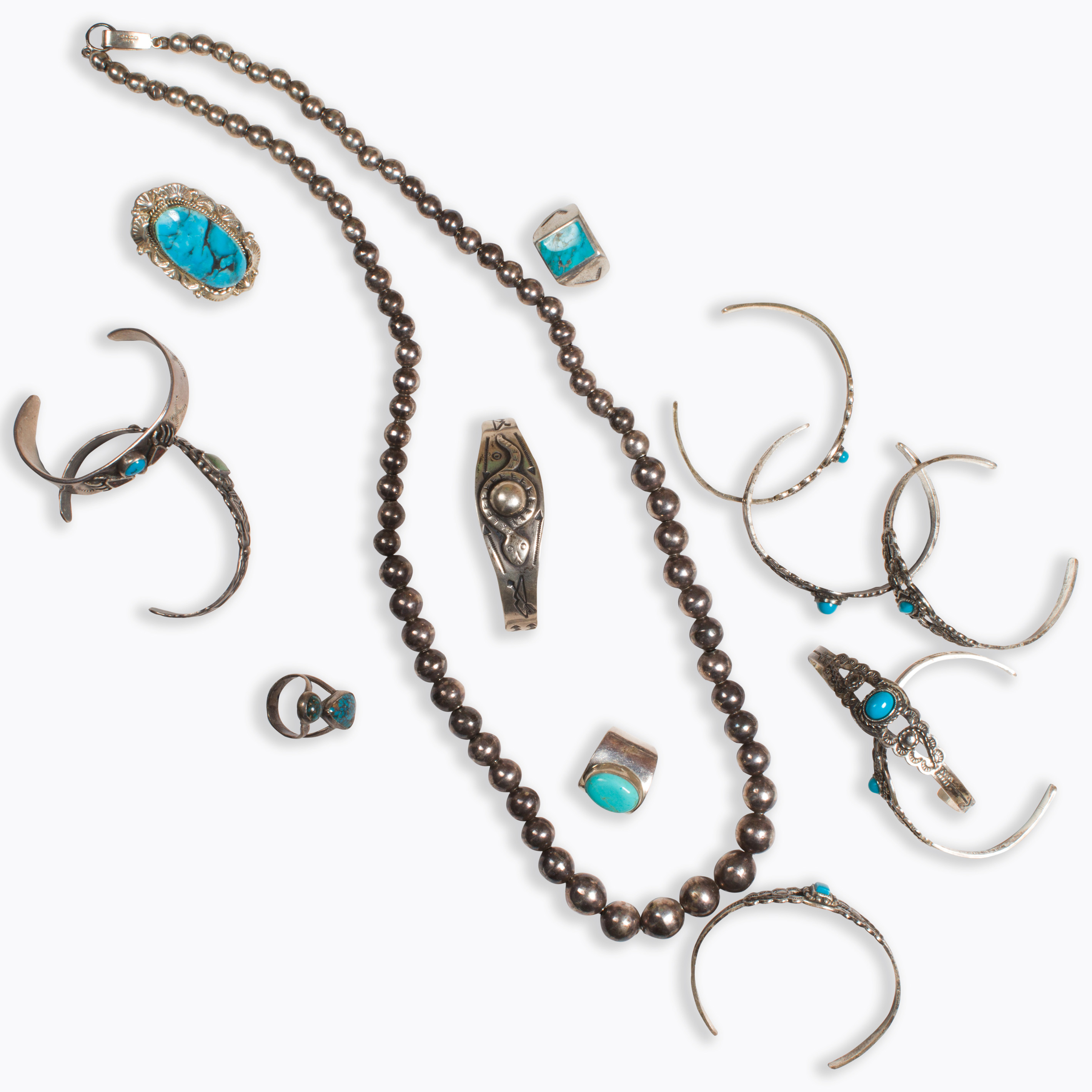 A GROUP OF TURQUOISE AND SILVER 3a4343