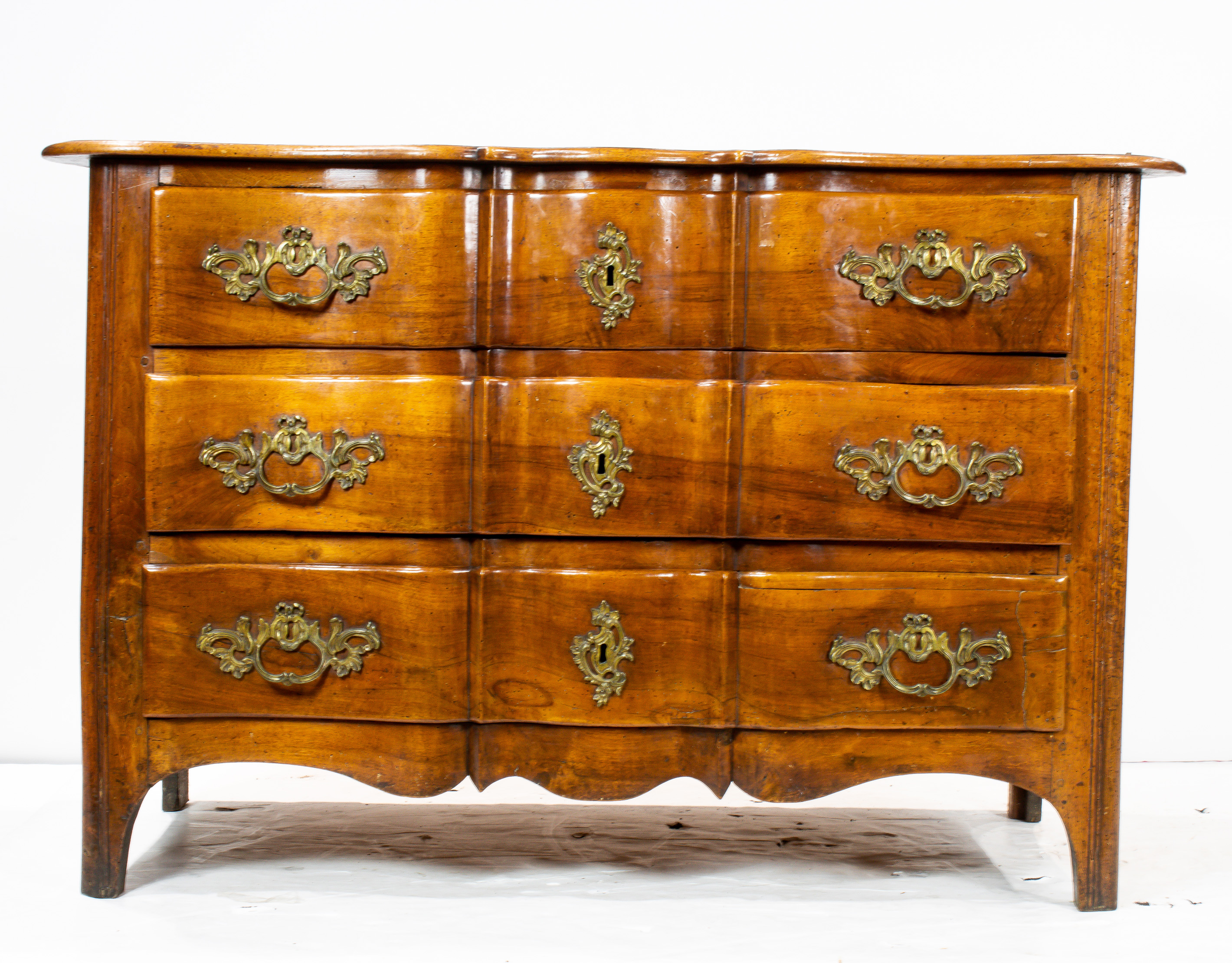 A FRENCH PROVINCIAL LOUIS XV COMMODE