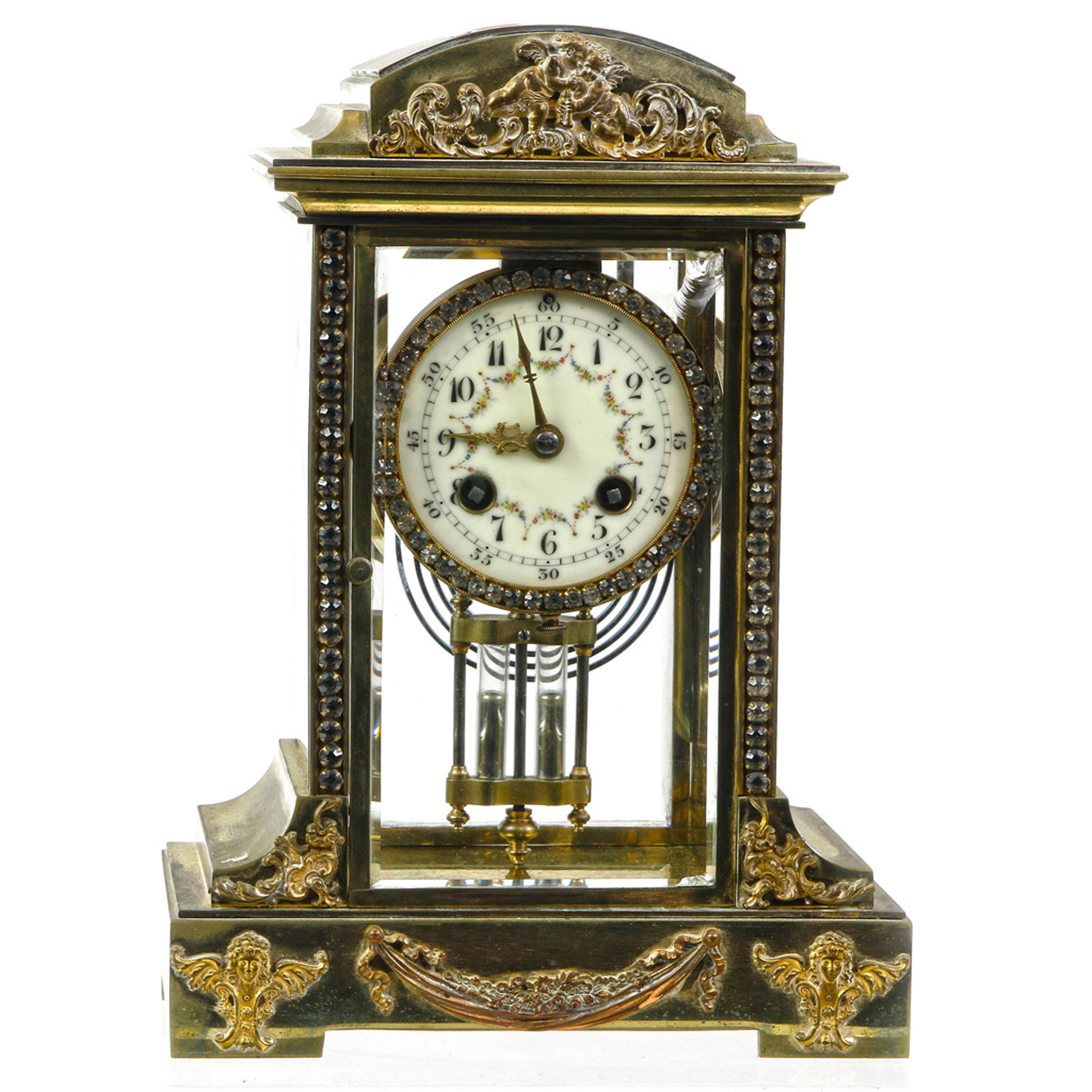 A FRENCH GILT BRASS AND JEWELED