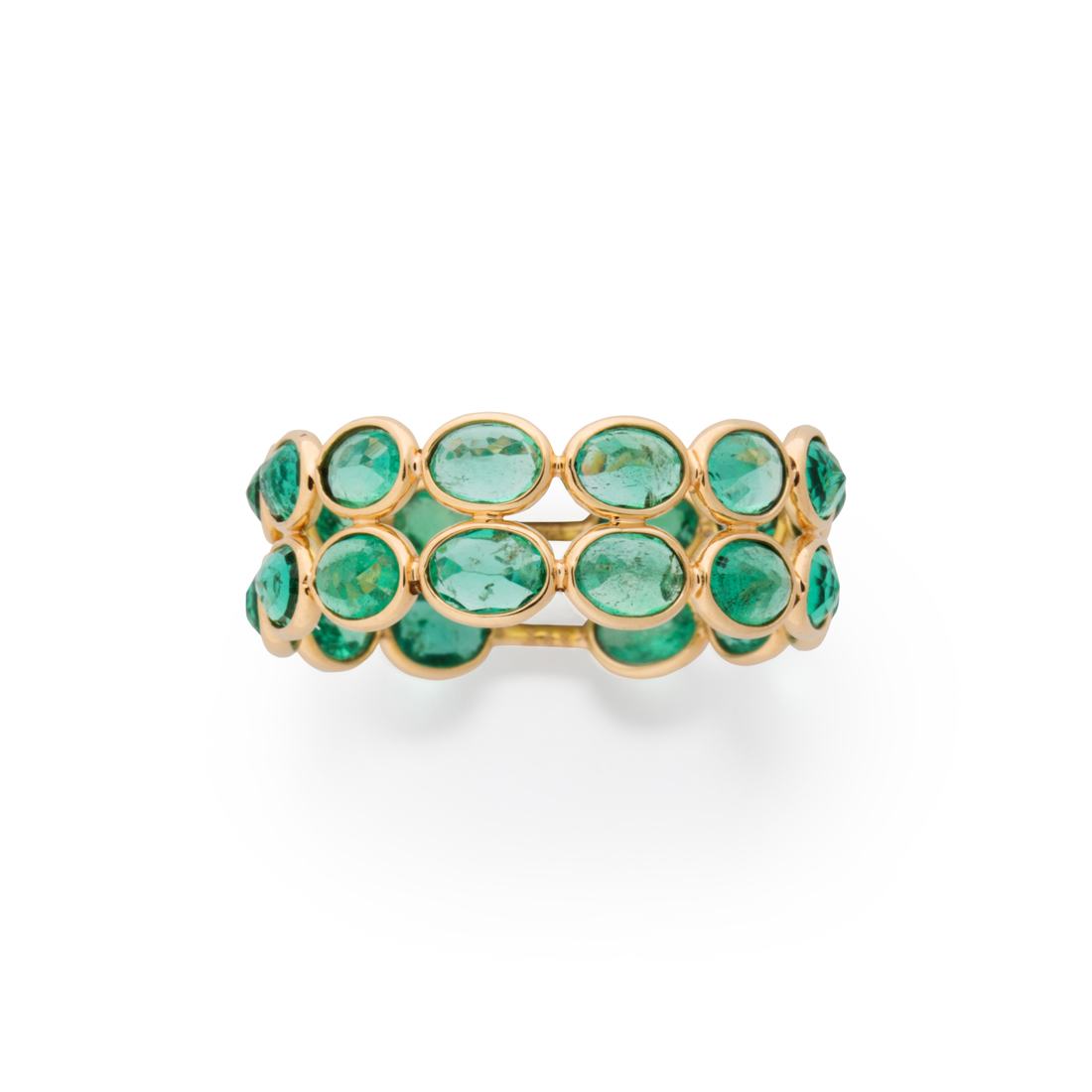 AN EMERALD AND EIGHTEEN KARAT GOLD