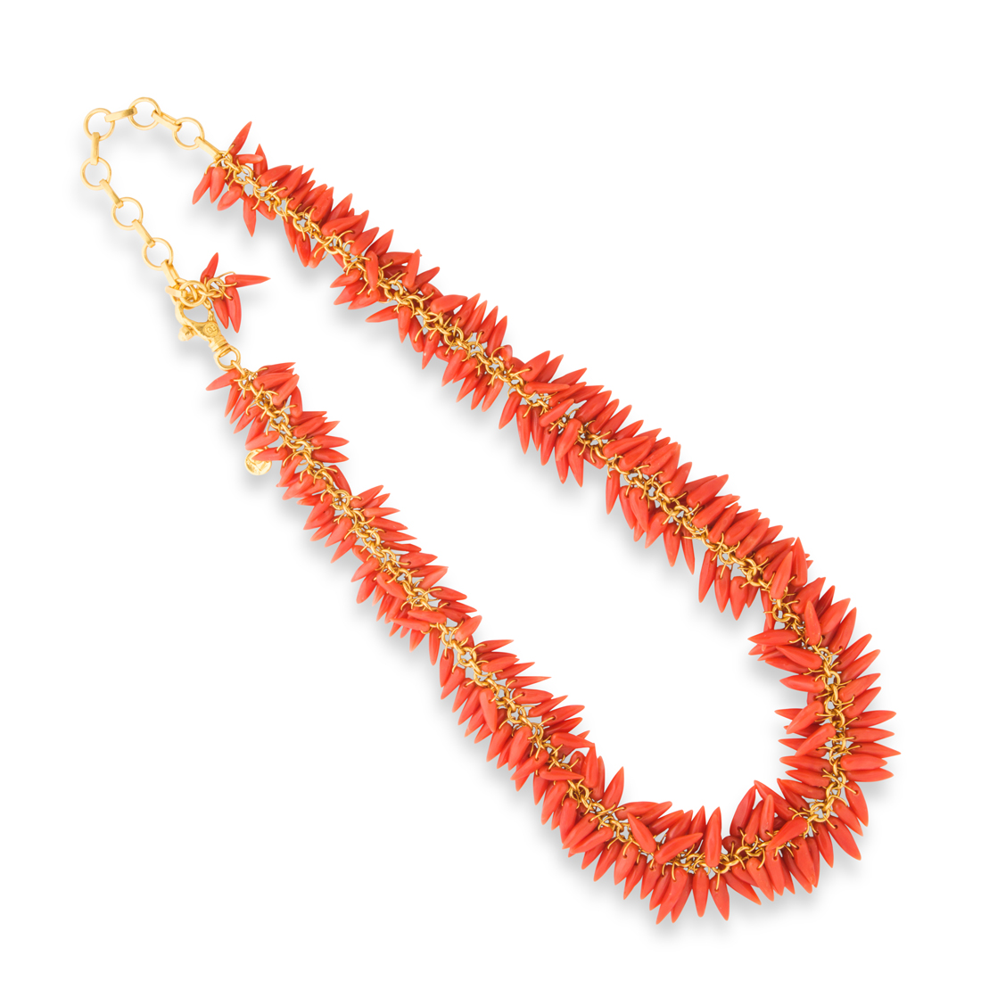 A CORAL AND TWENTY-TWO KARAT GOLD