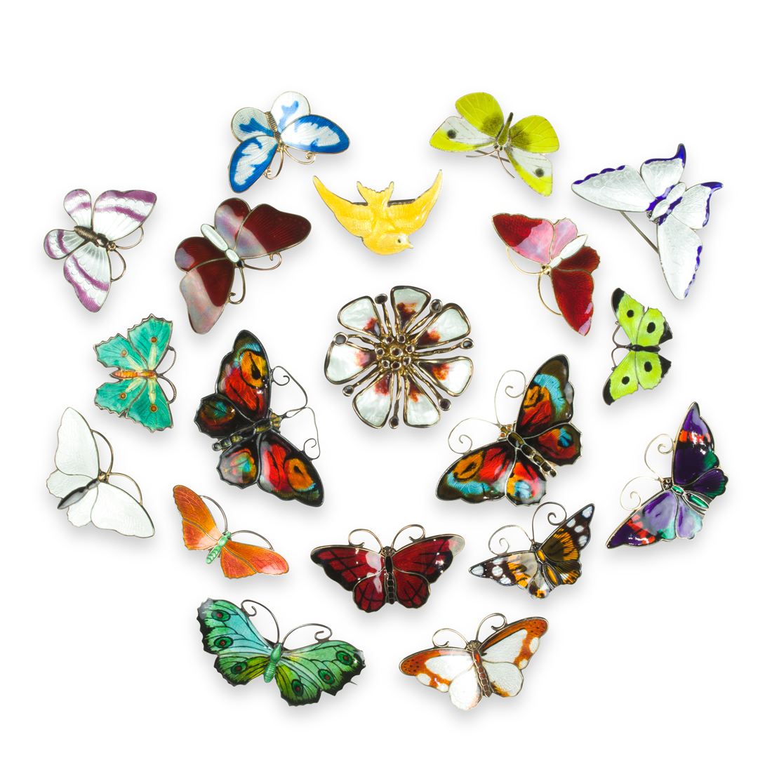 A GROUP OF ENAMEL AND SILVER BROOCHES