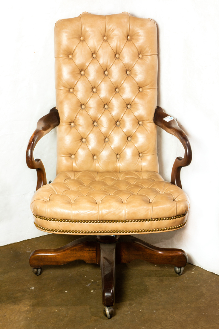 A CHESTERFIELD STYLE OFFICE CHAIR, HAVING