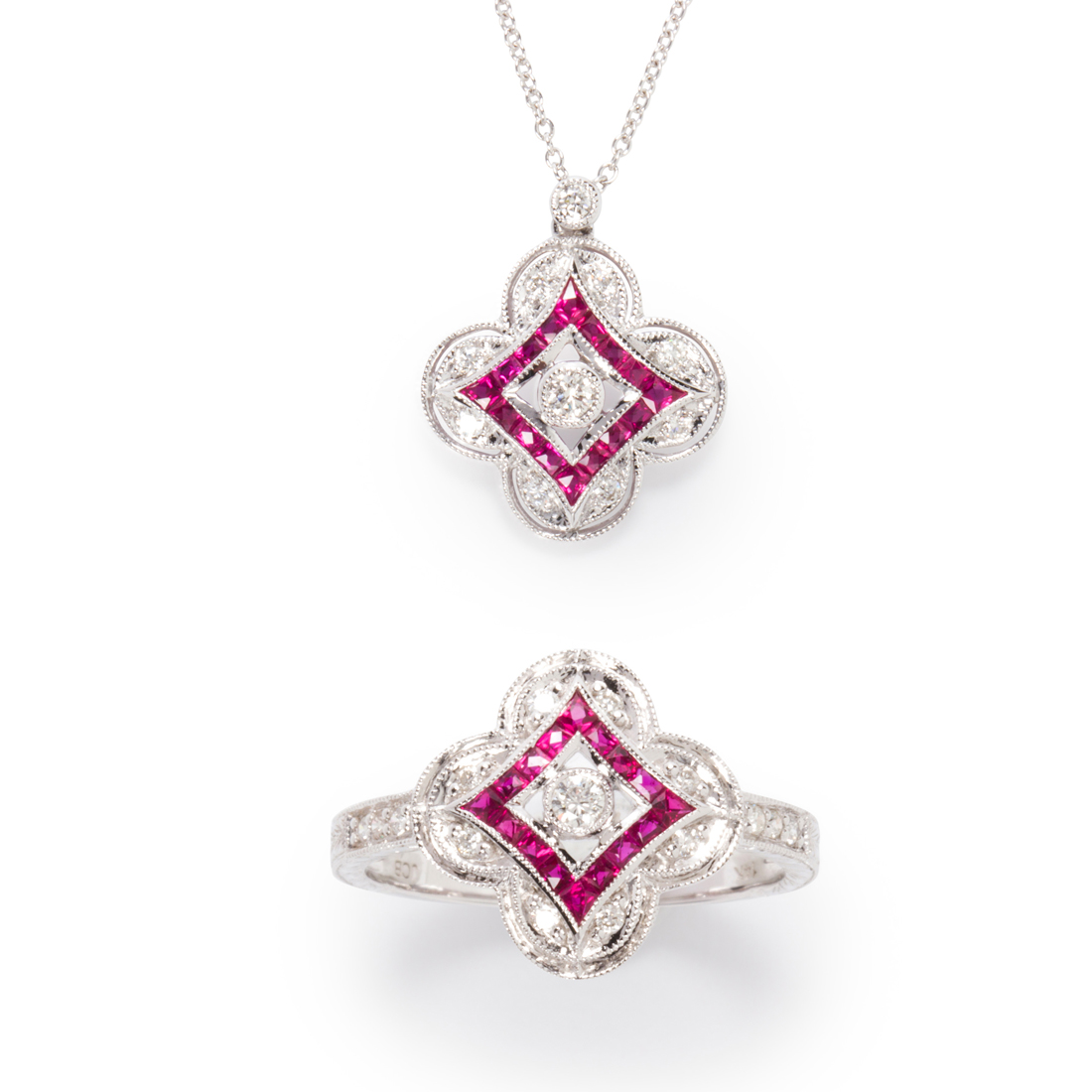 A RUBY AND DIAMOND RING AND PENDANT