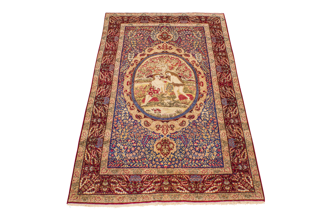 A SCENIC PERSIAN KERMAN CARPET A scenic