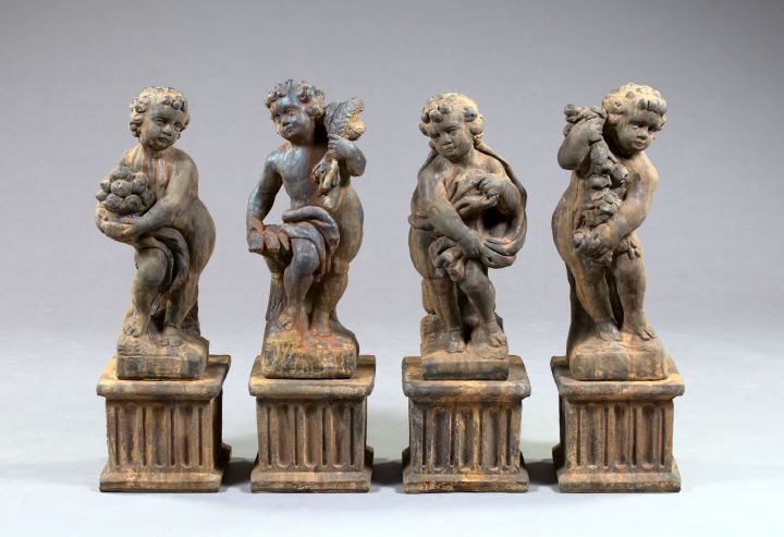 Suite of Four Cast-Stone Garden Figures-on-Pedestals,