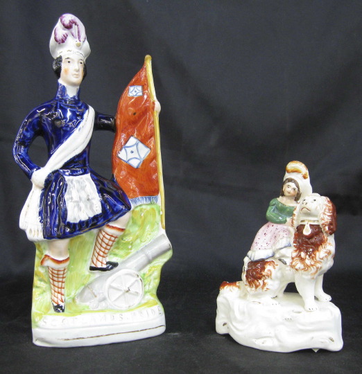 Two Staffordshire Pottery Figures  3a5bc3