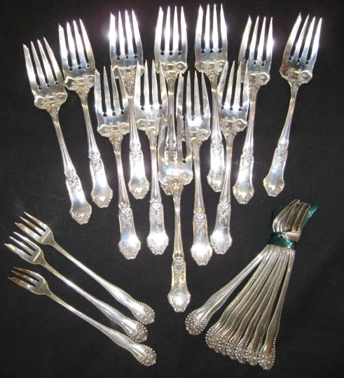 Collection of Twenty-Four Sterling Silver