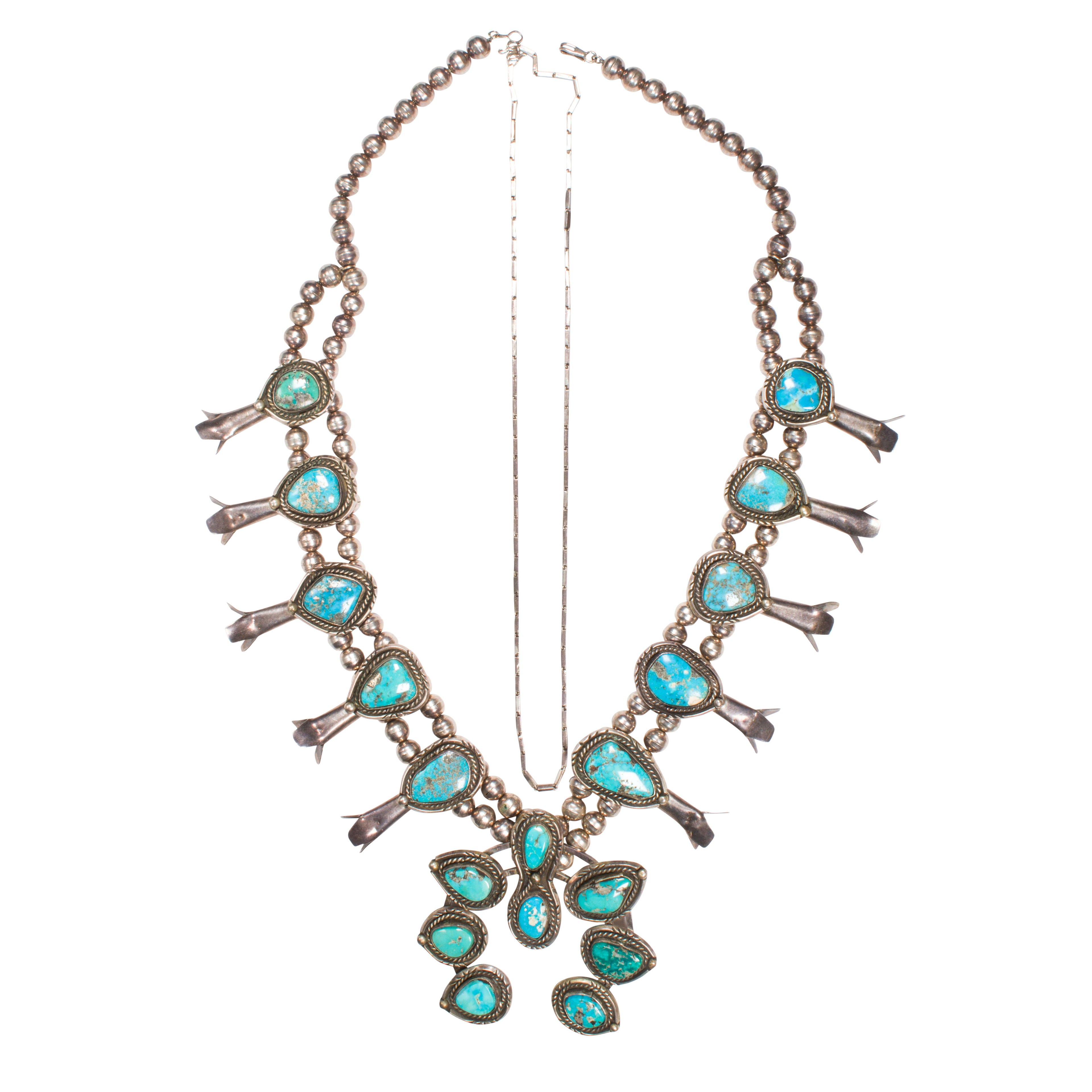 A TURQUOISE AND SILVER NECKLACE