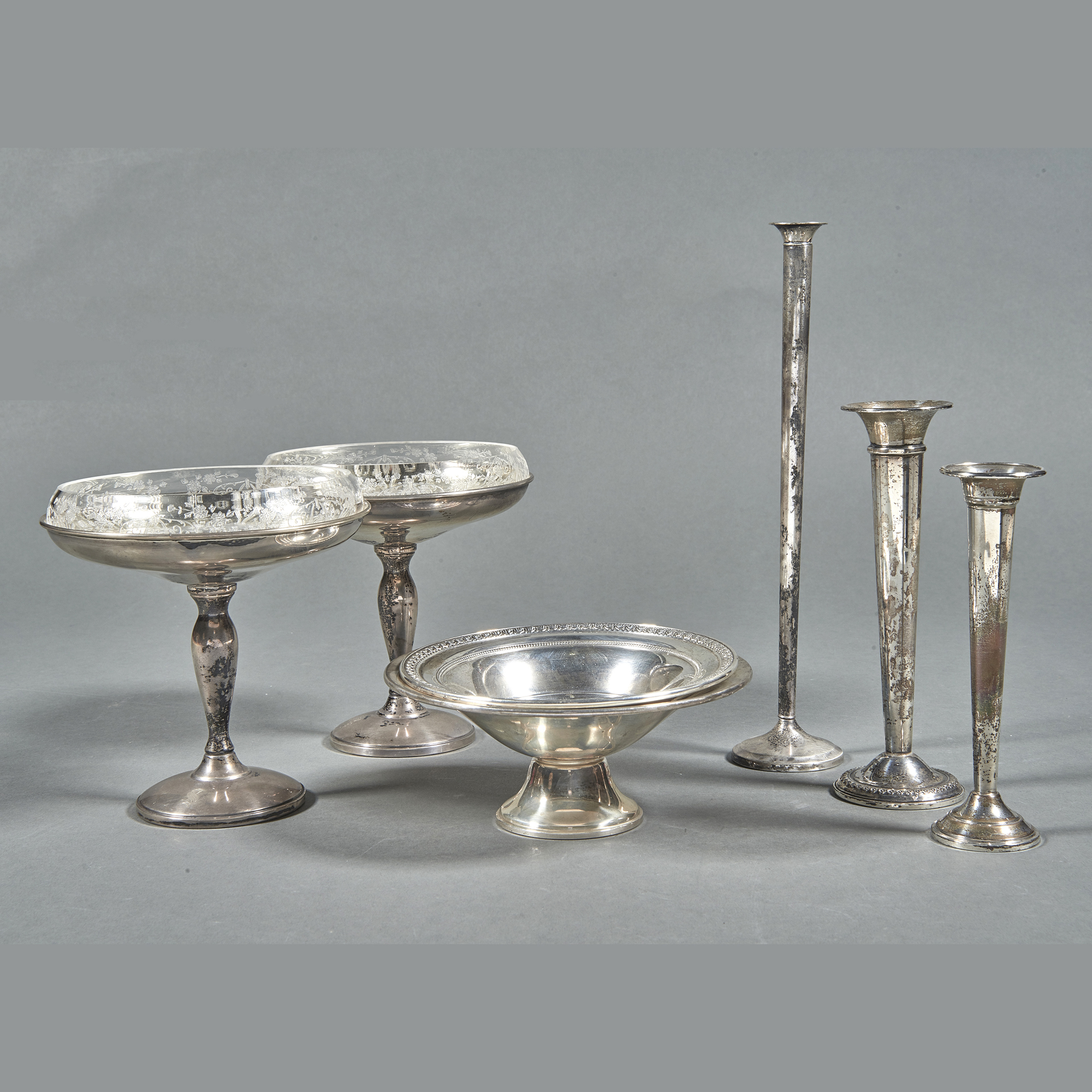 (7) STERLING WEIGHTED ITEMS: 3 BUD VASES;