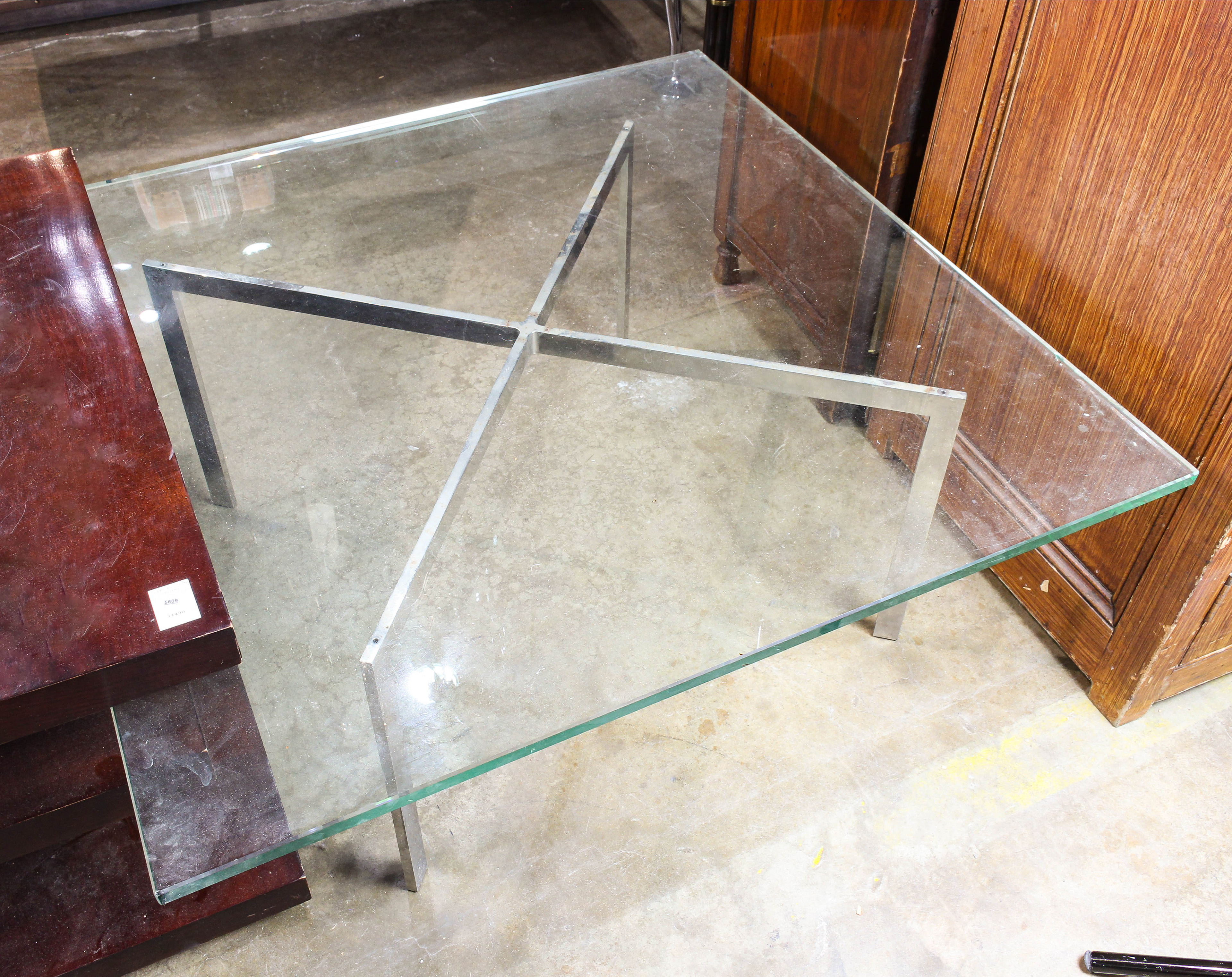 MODERN GLASS TOP TABLE WITH X FORM 3a6282