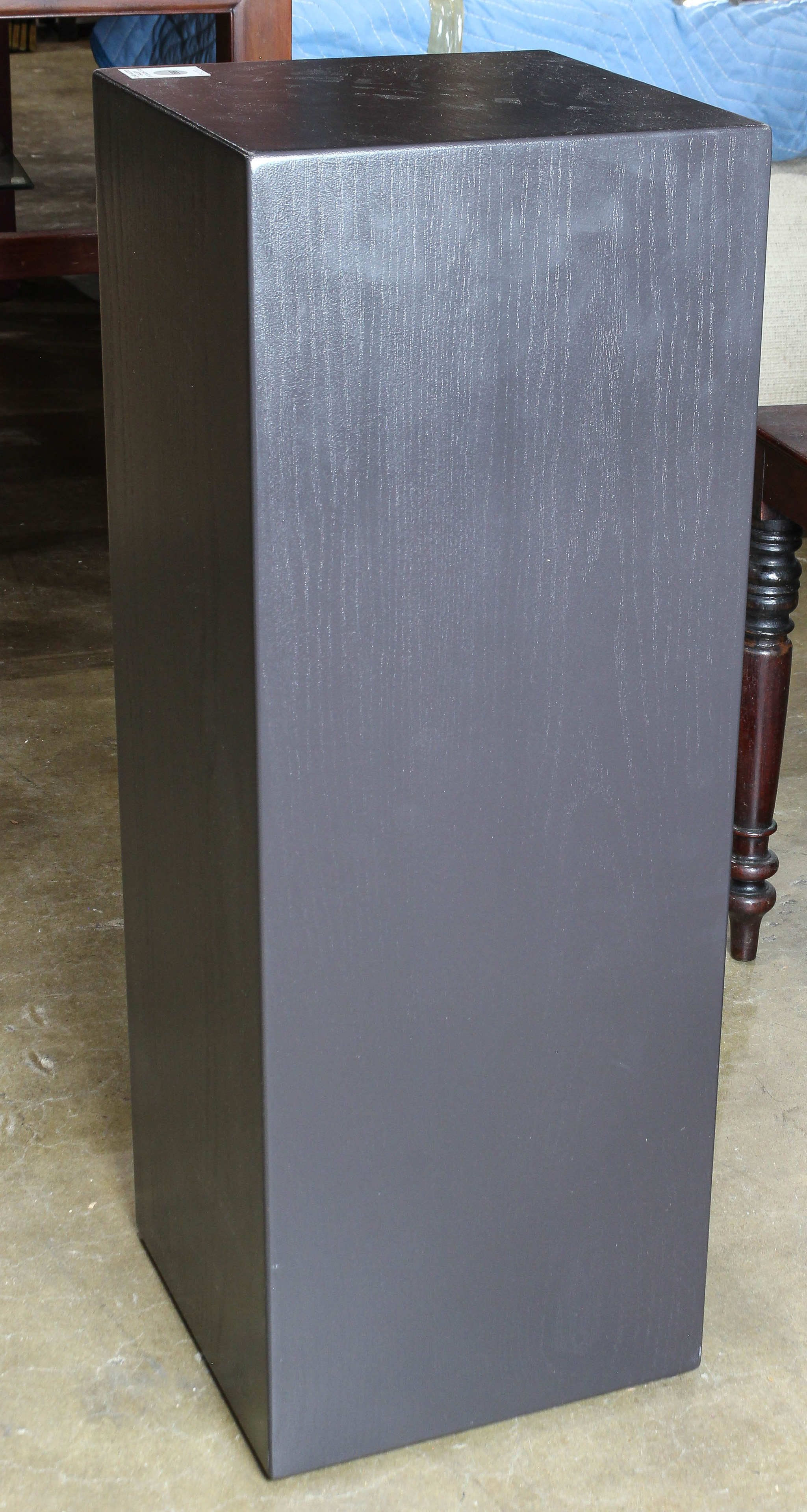 A MODERNIST EBONIZED PEDESTAL A