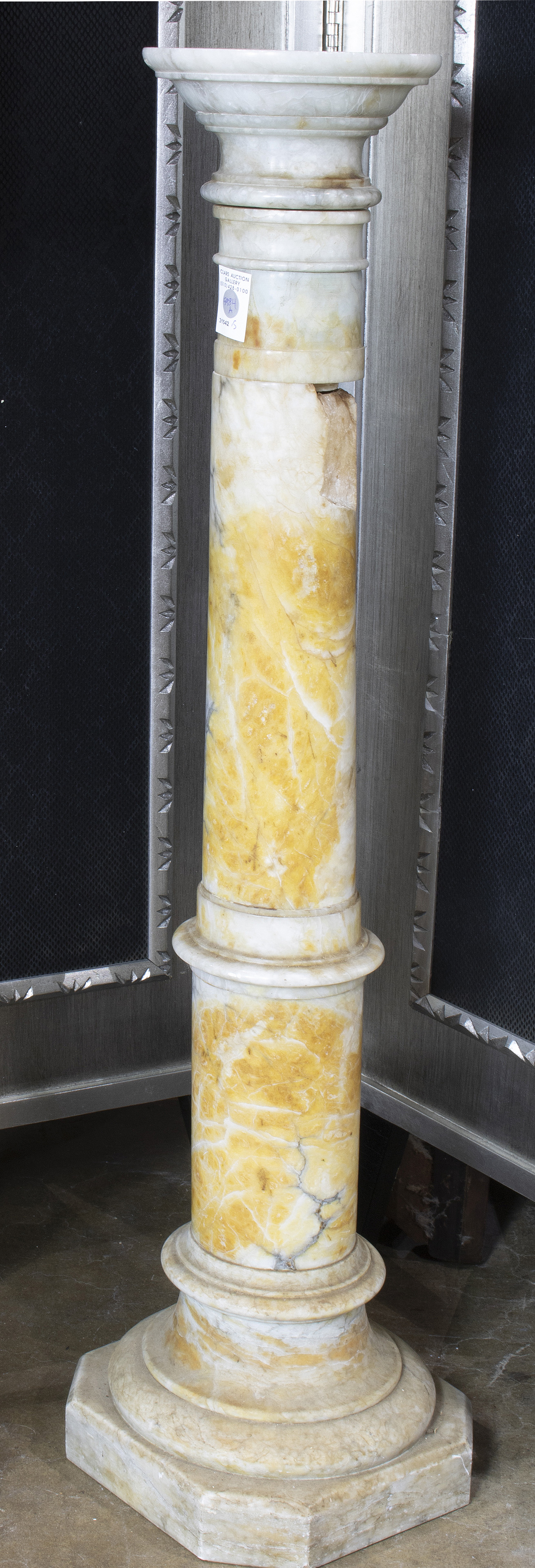 A VARIEGATED MARBLE PEDESTAL A