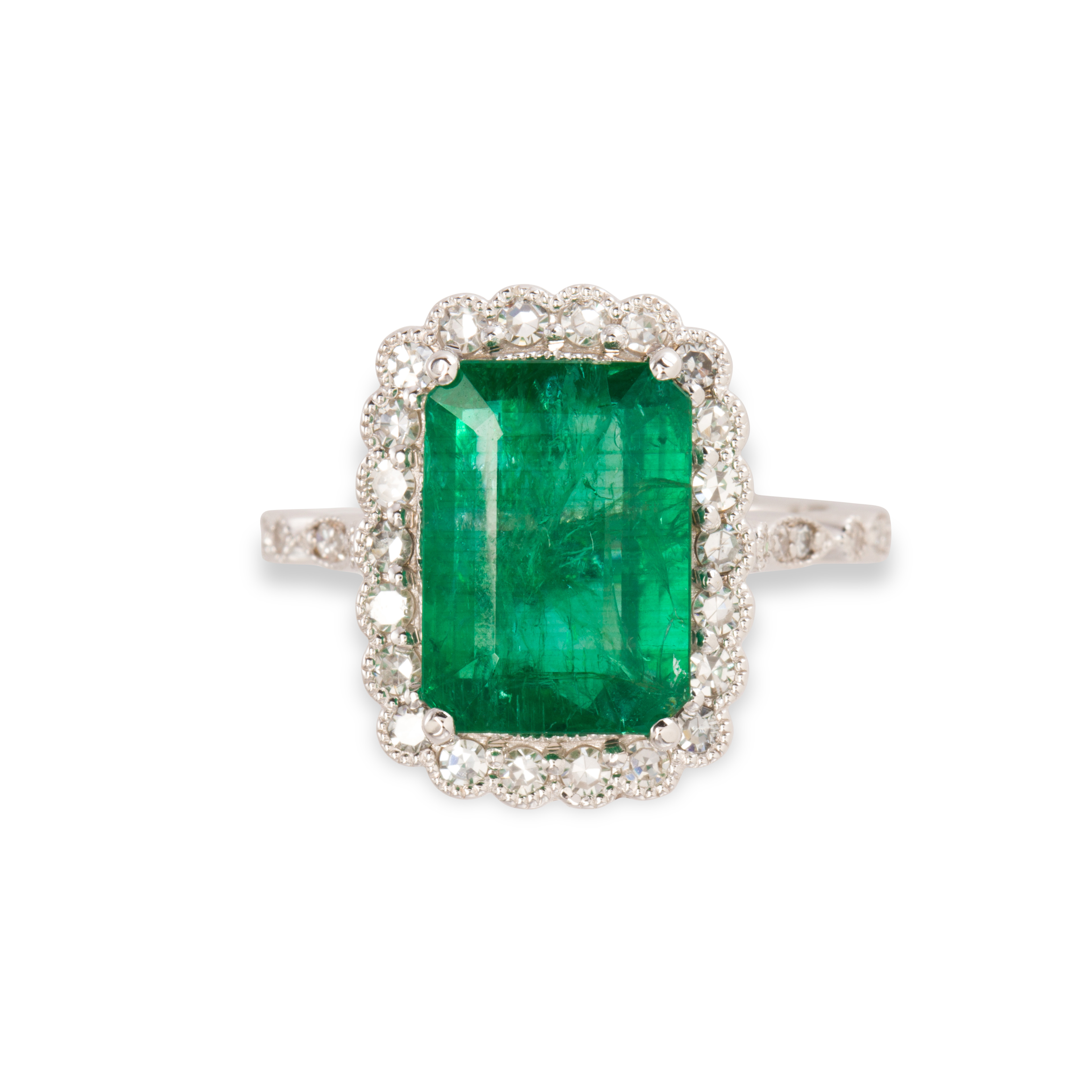 AN EMERALD DIAMOND AND EIGHTEEN 3a6393