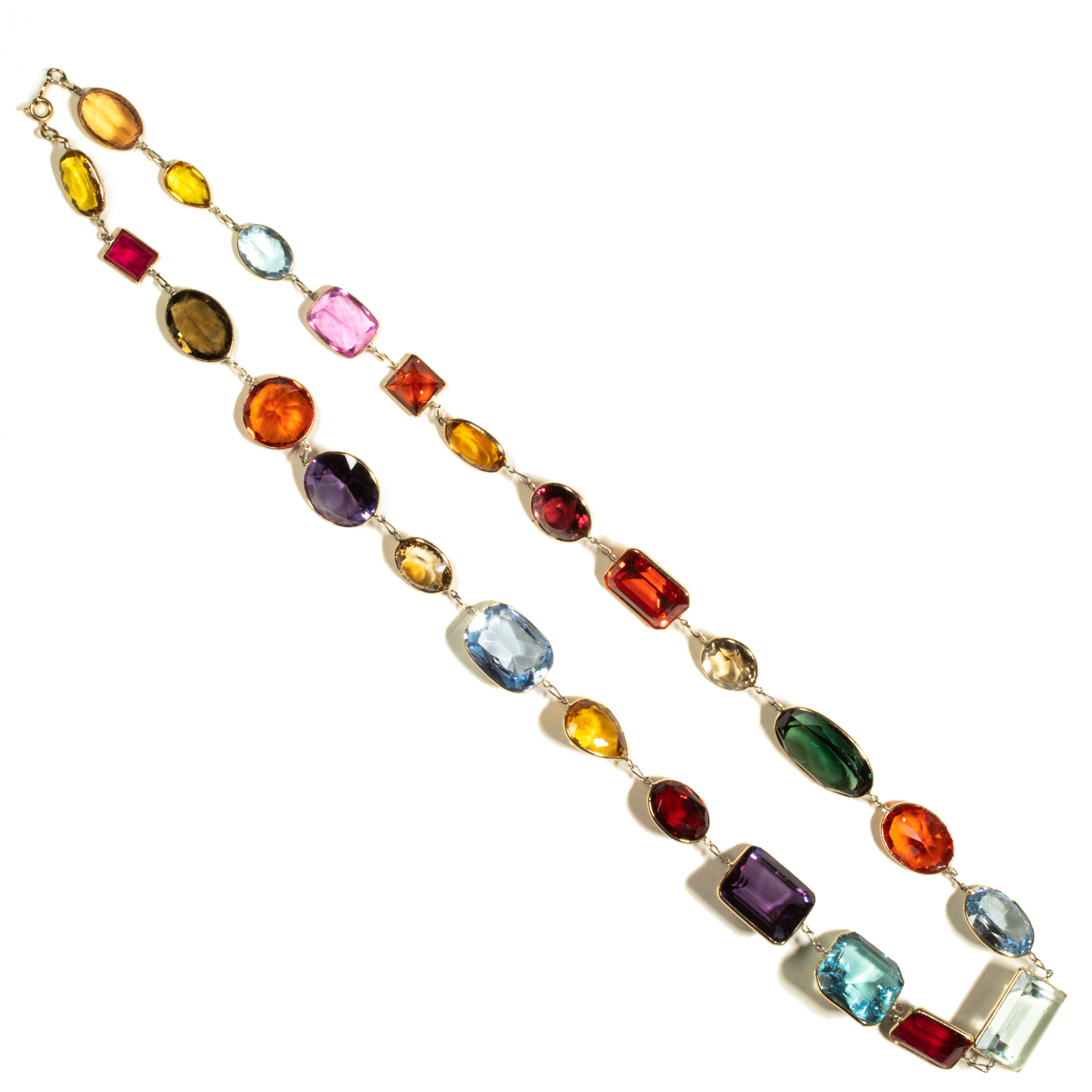 A MULTI-GEMSTONE AND FOURTEEN KARAT