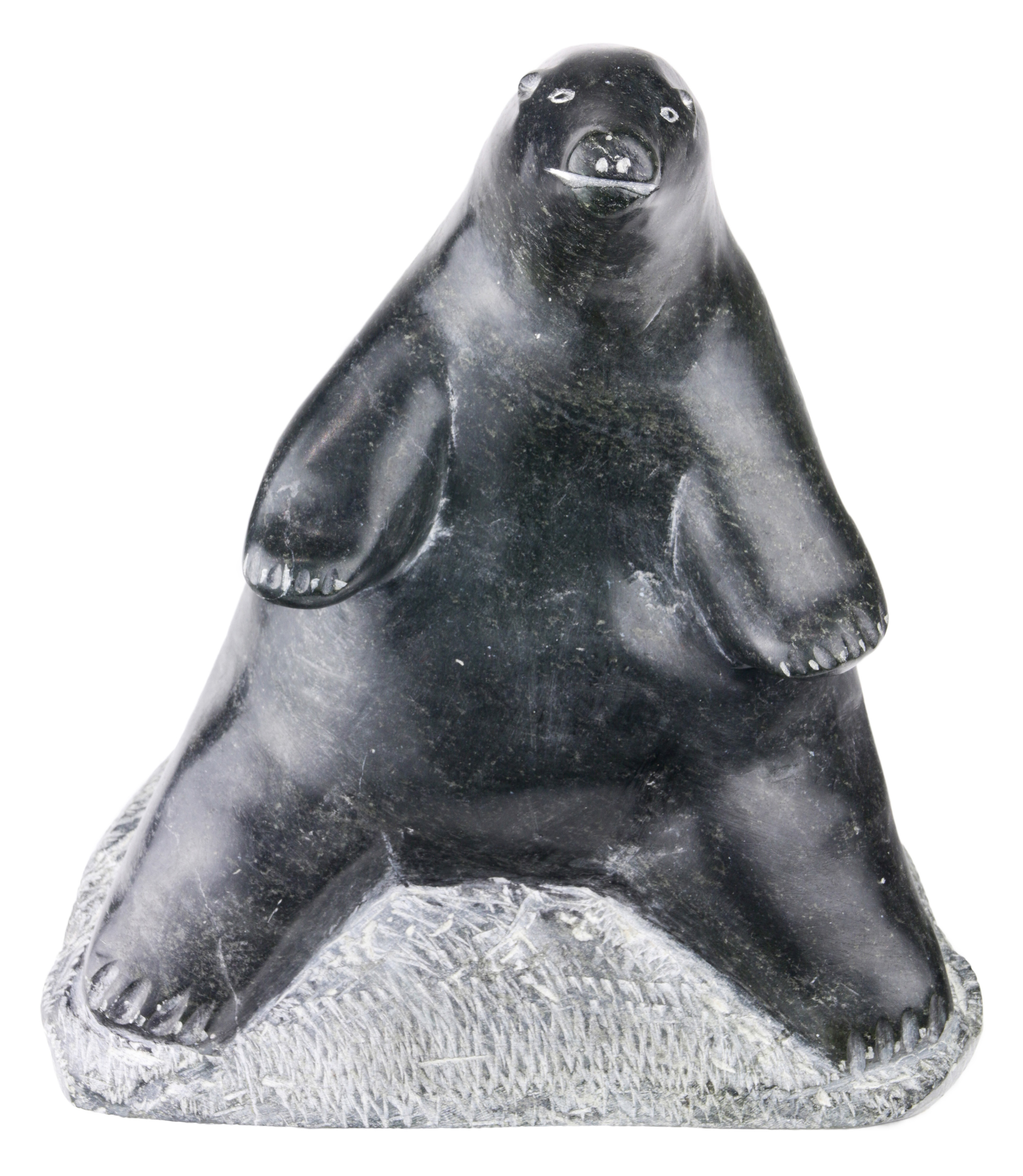 AN INUIT FIGURAL SCULPTURE ATTRIBUTED