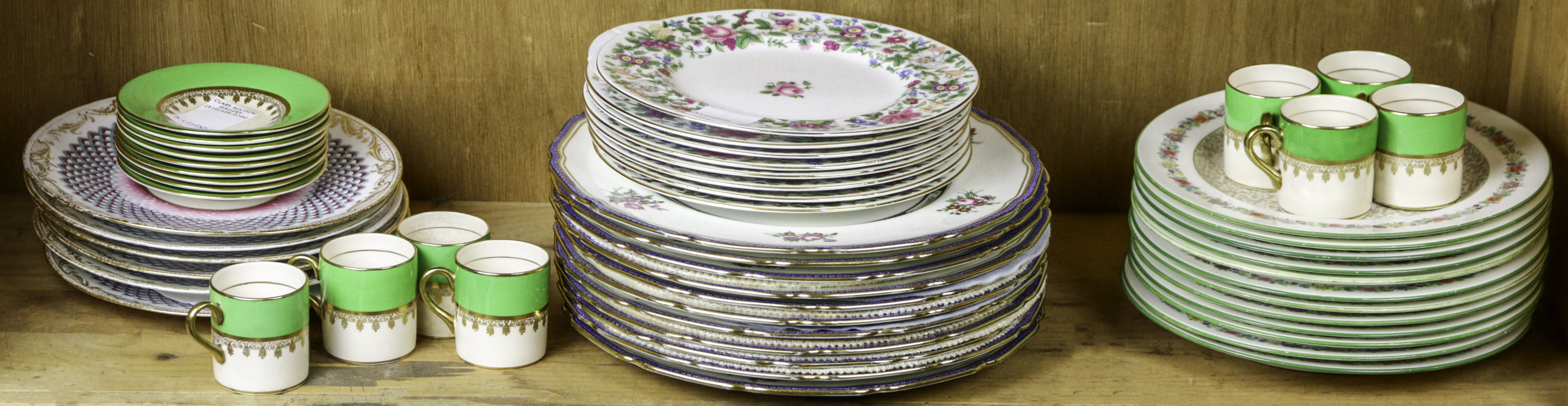 ONE SHELF OF ASSORTED PORCELAIN PLATES