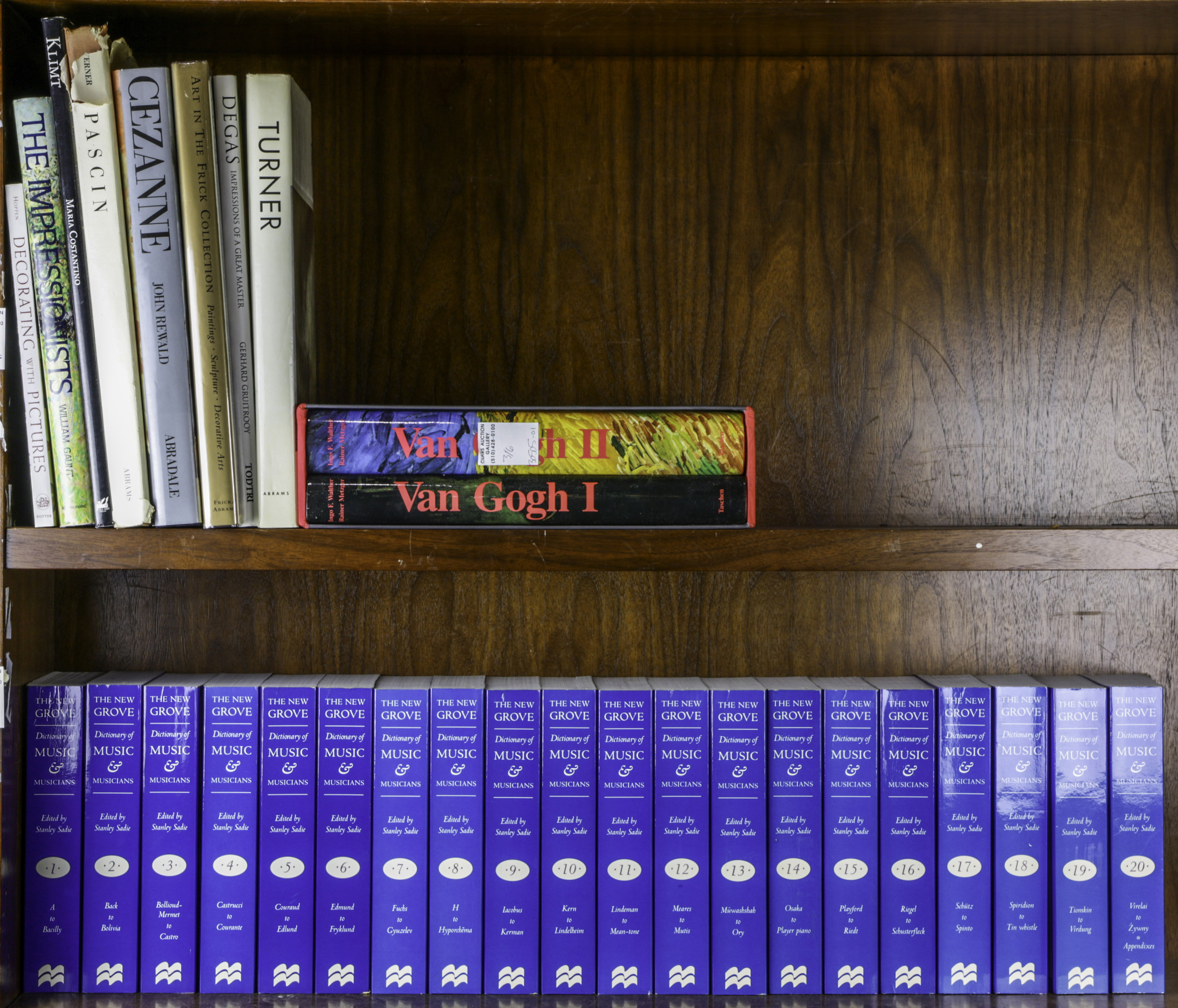 TWO SHELVES OF BOOKS ON MUSIC AND