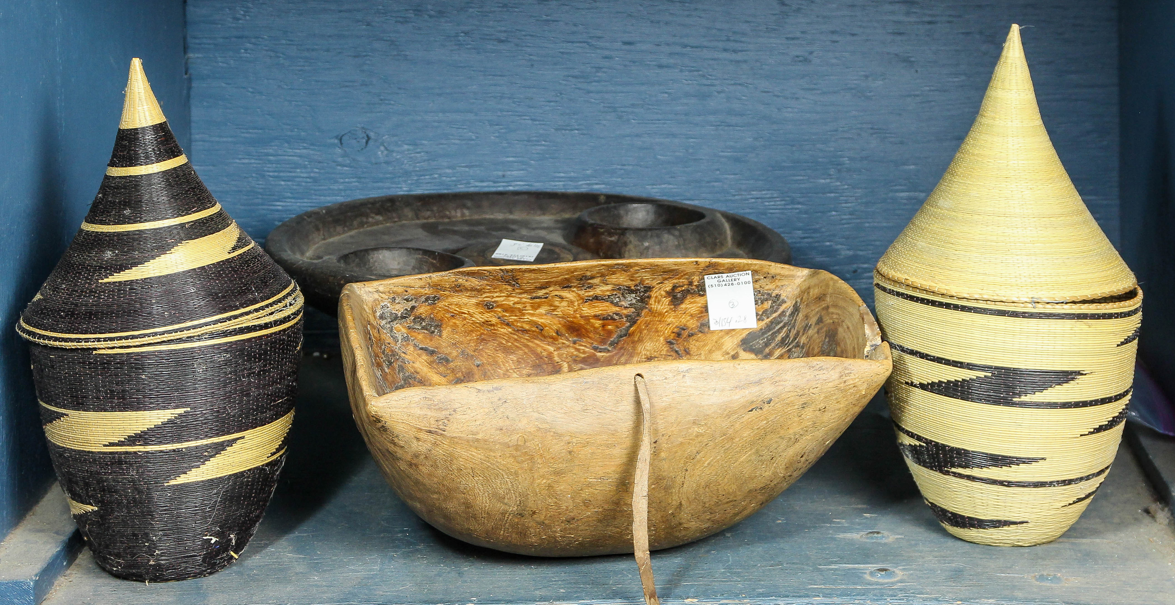 A COLLECTION OF BASKETS AND WOOD