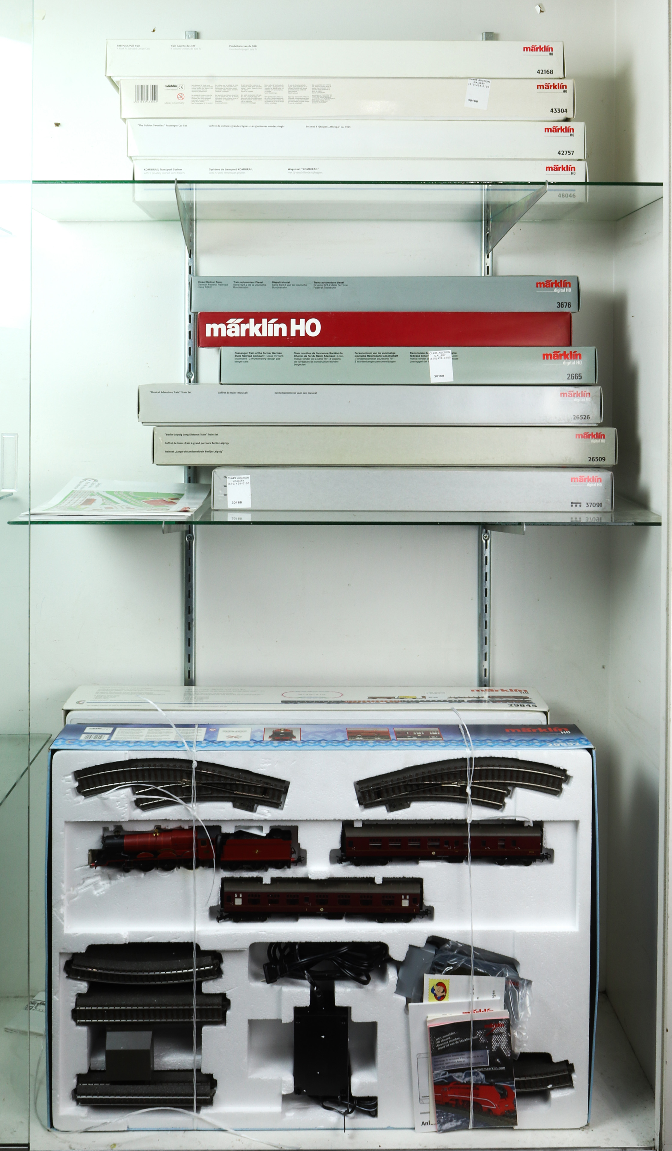 FOUR SHELVES OF MARKLIN BOXED MODEL