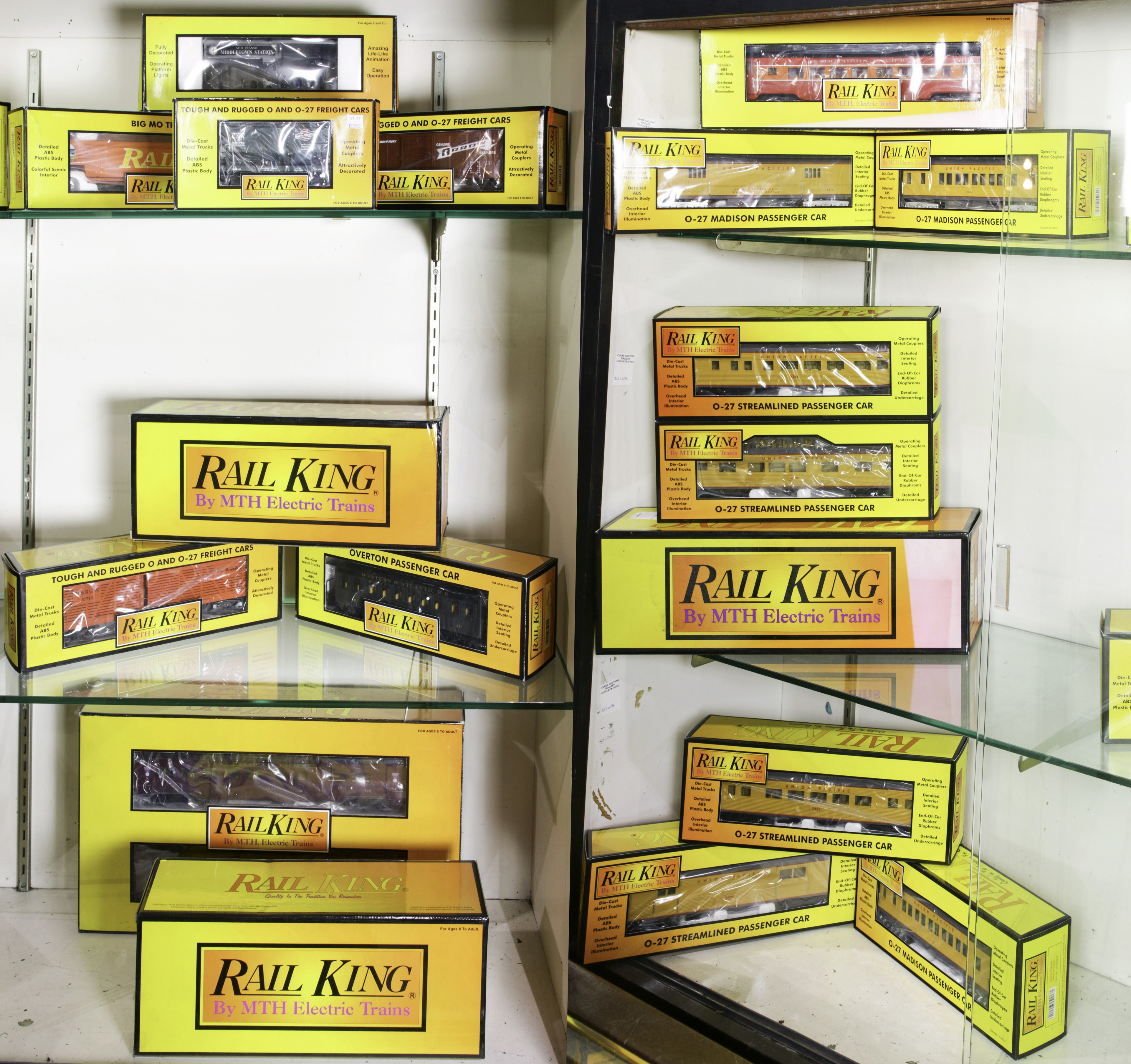 THREE SHELVES OF RAIL KING BOXED