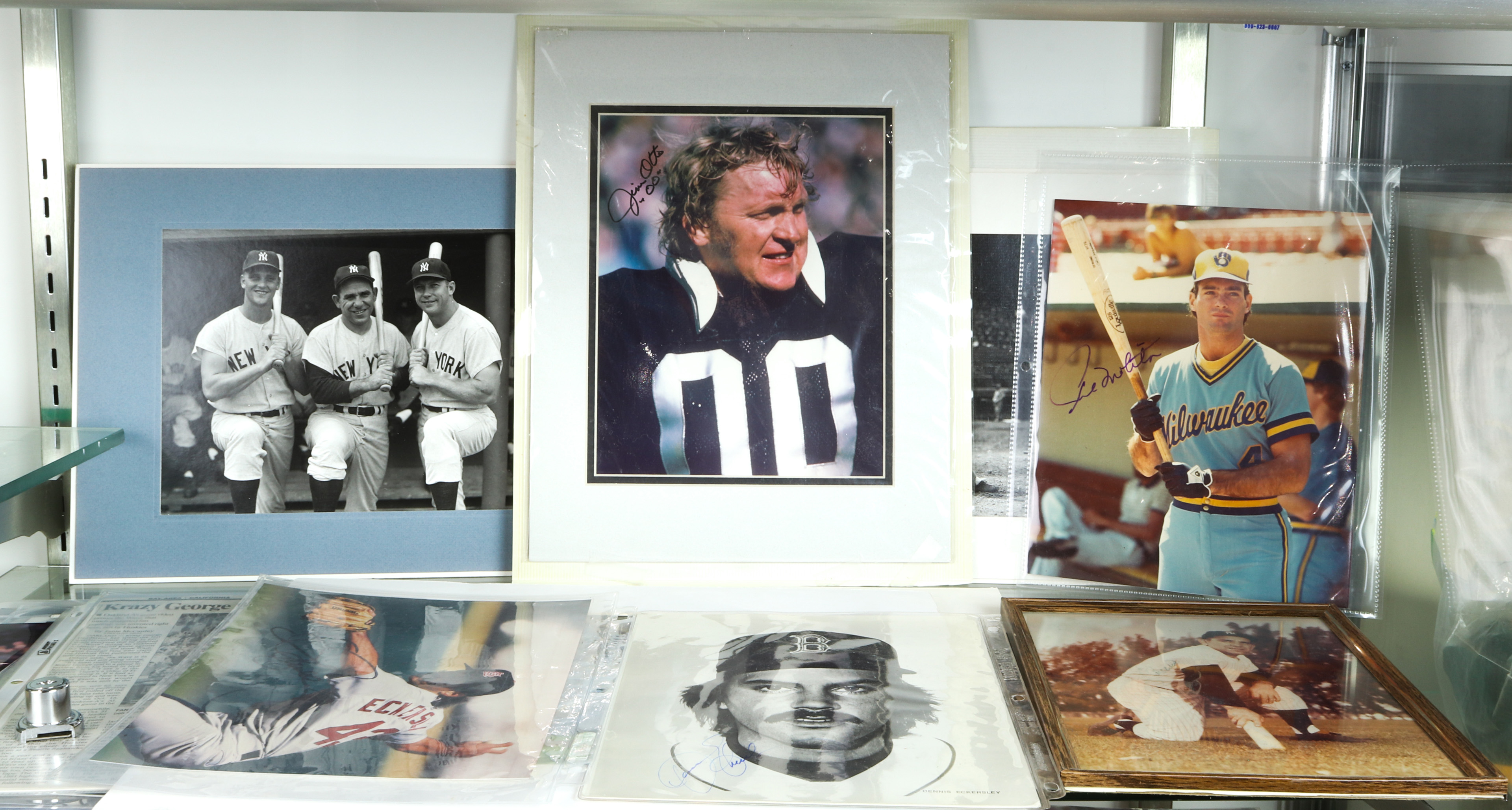 ONE SHELF OF BASEBALL MEMORABILIA One