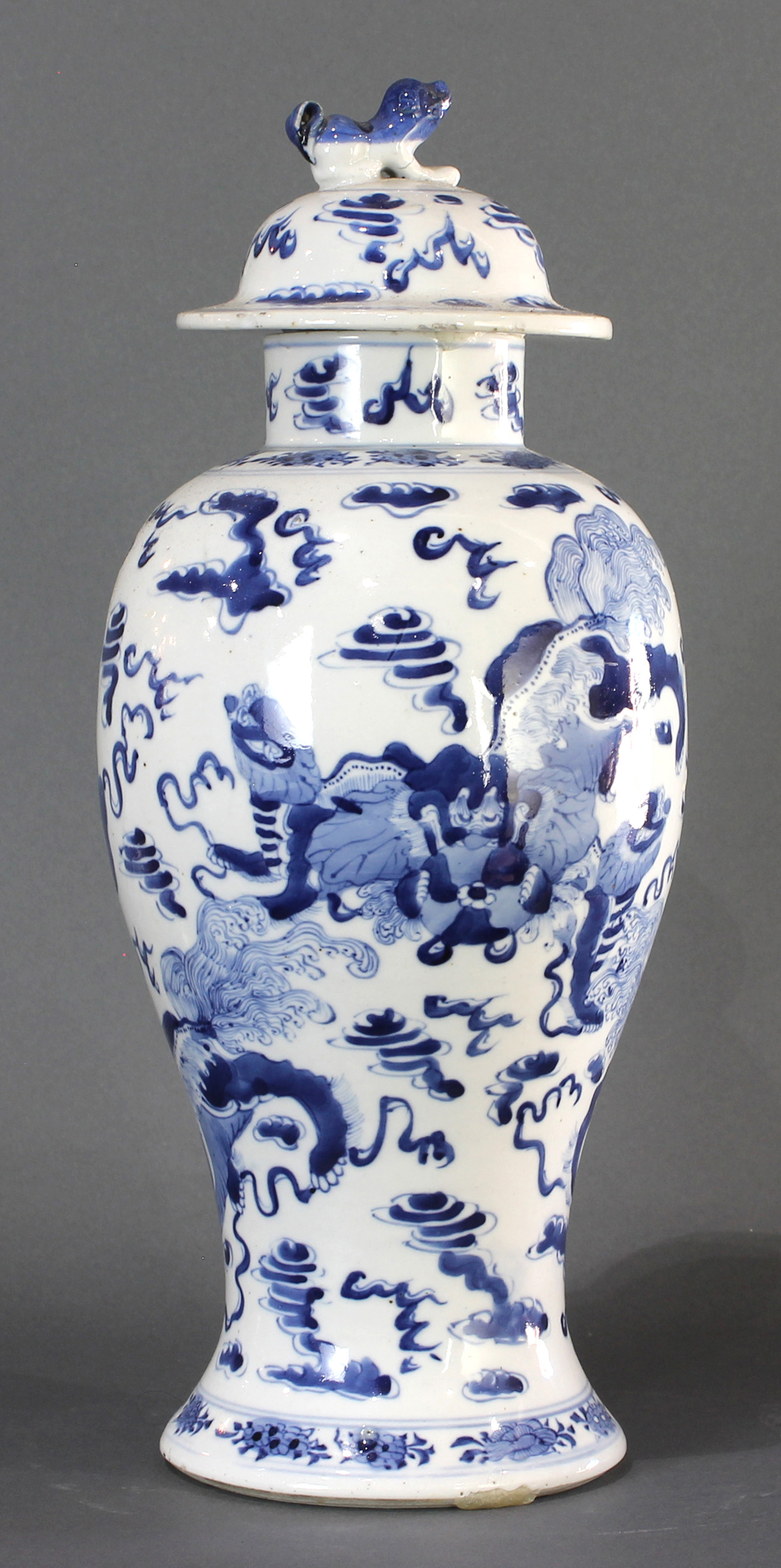 A CHINESE BLUE AND WHITE QILIN COVERED