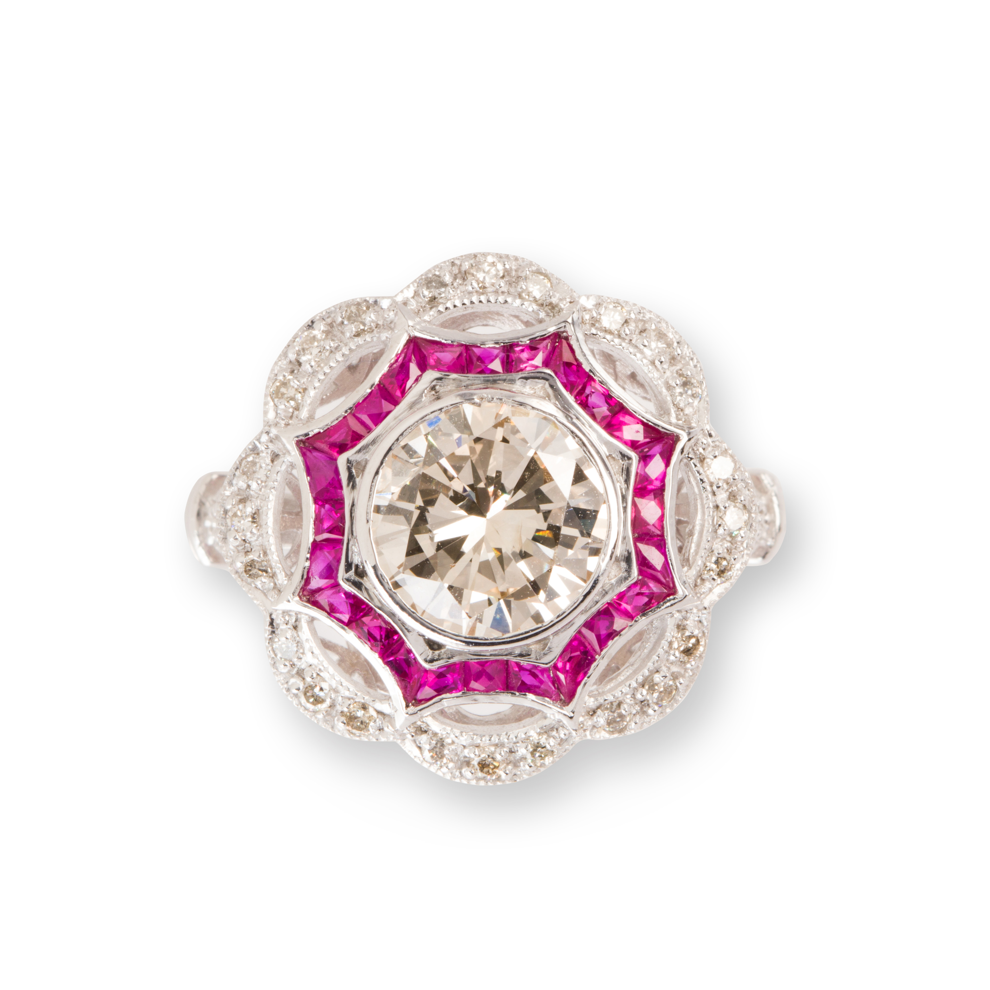 A DIAMOND, RUBY AND PLATINUM RING