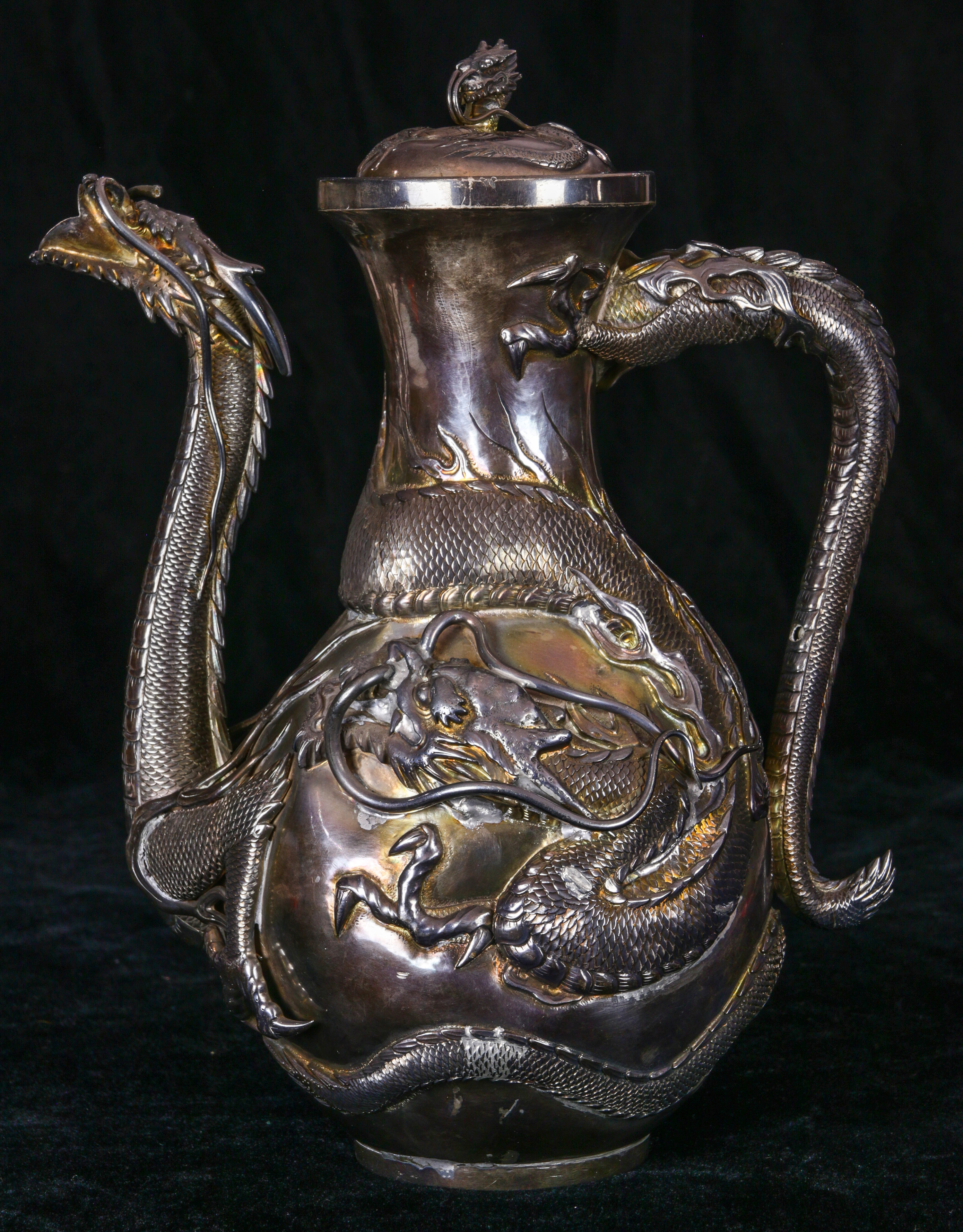 A CHINESE EXPORT DRAGON SILVER