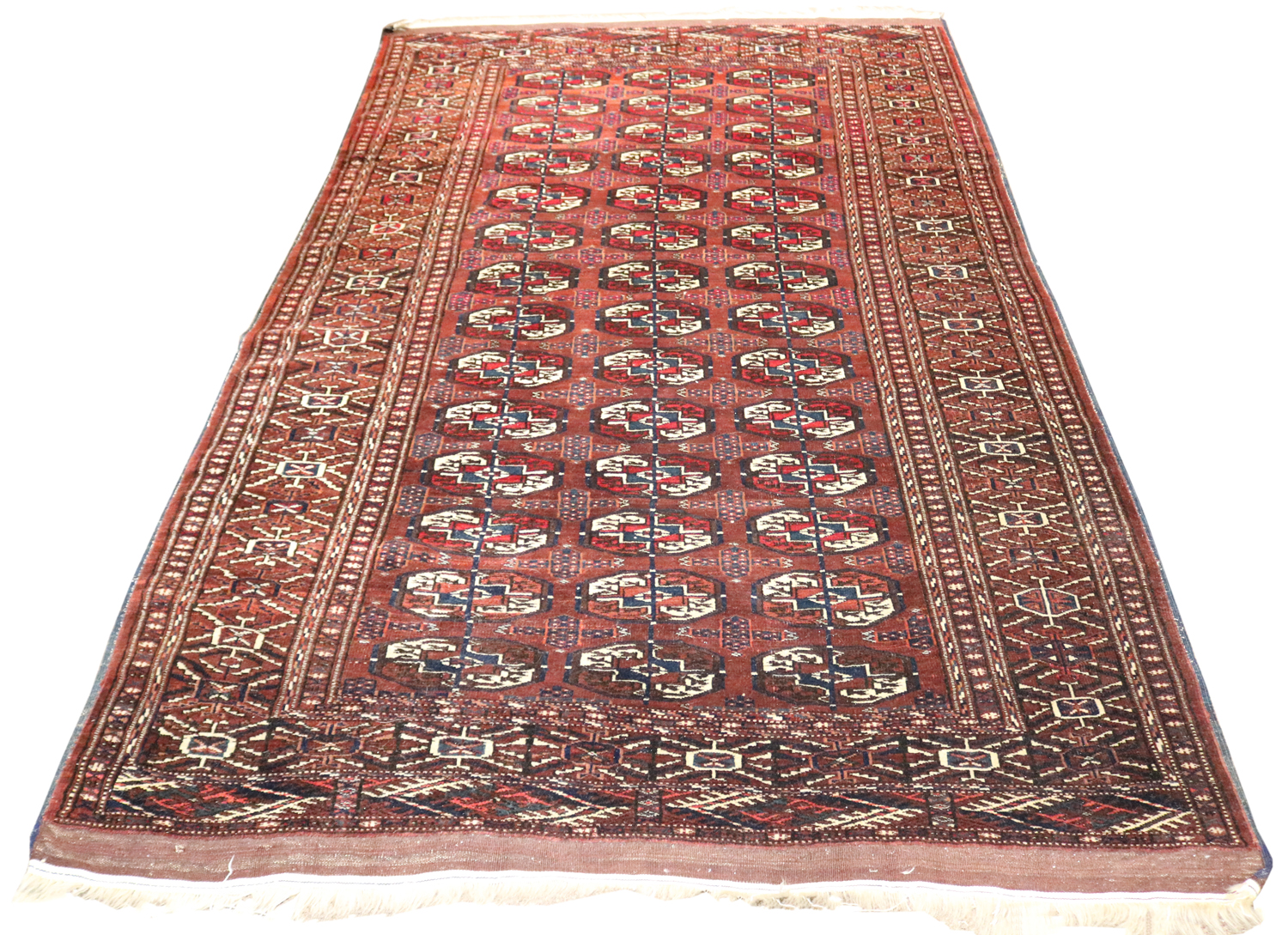 AN AFGHAN CARPET 4'10" X 7'11"