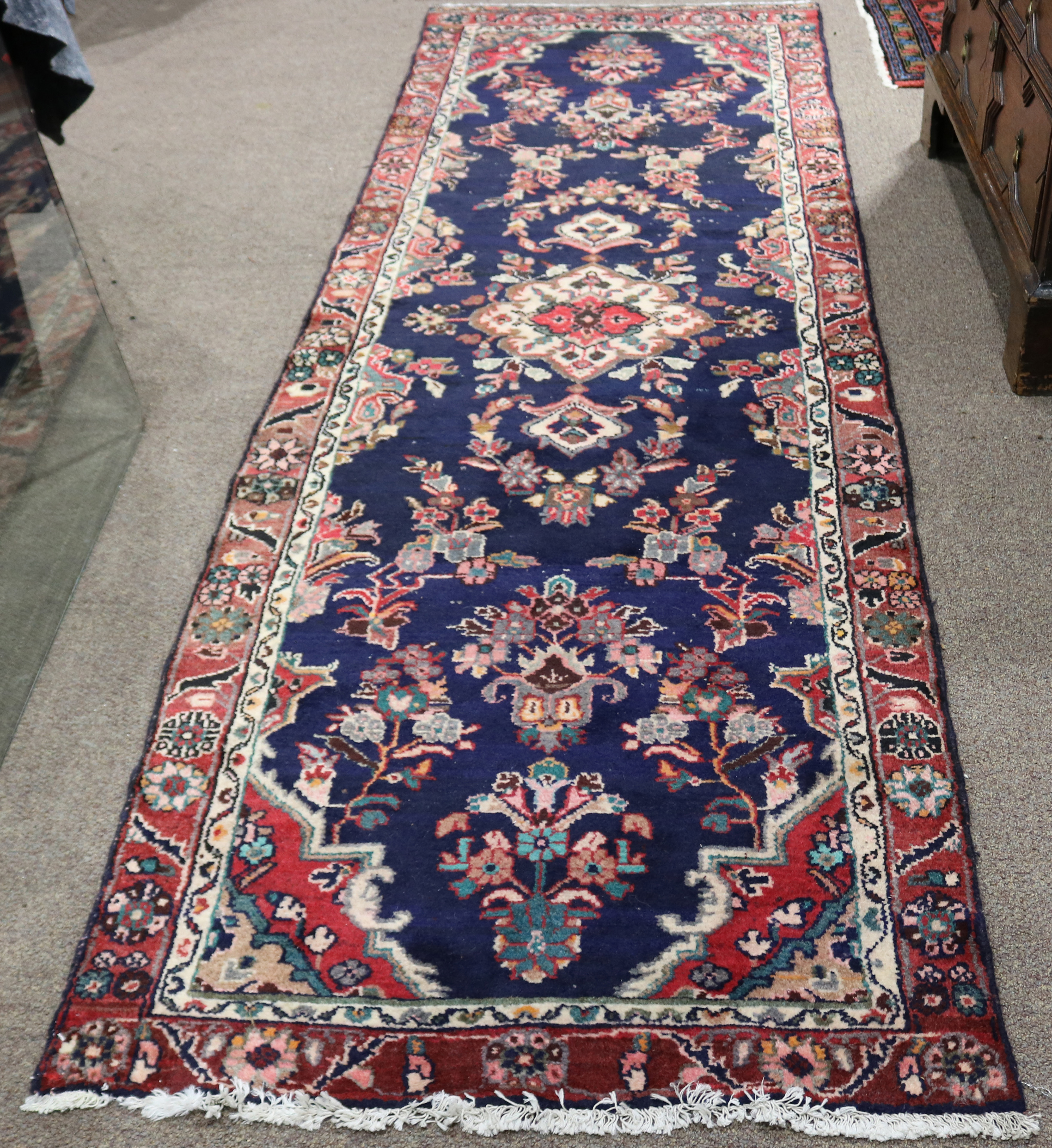 A PERSIAN HAMADAN RUNNER, 3' X