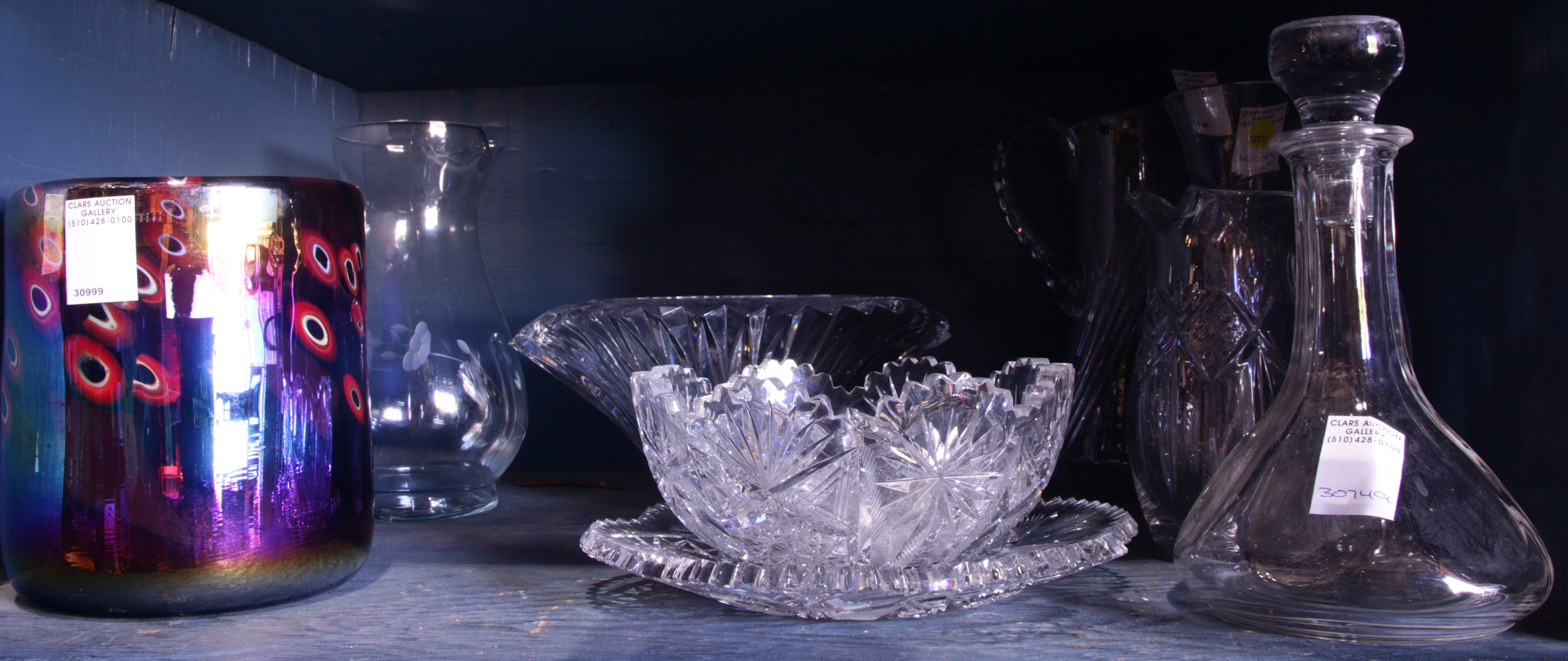 FOUR SHELVES OF GLASSWARE Four