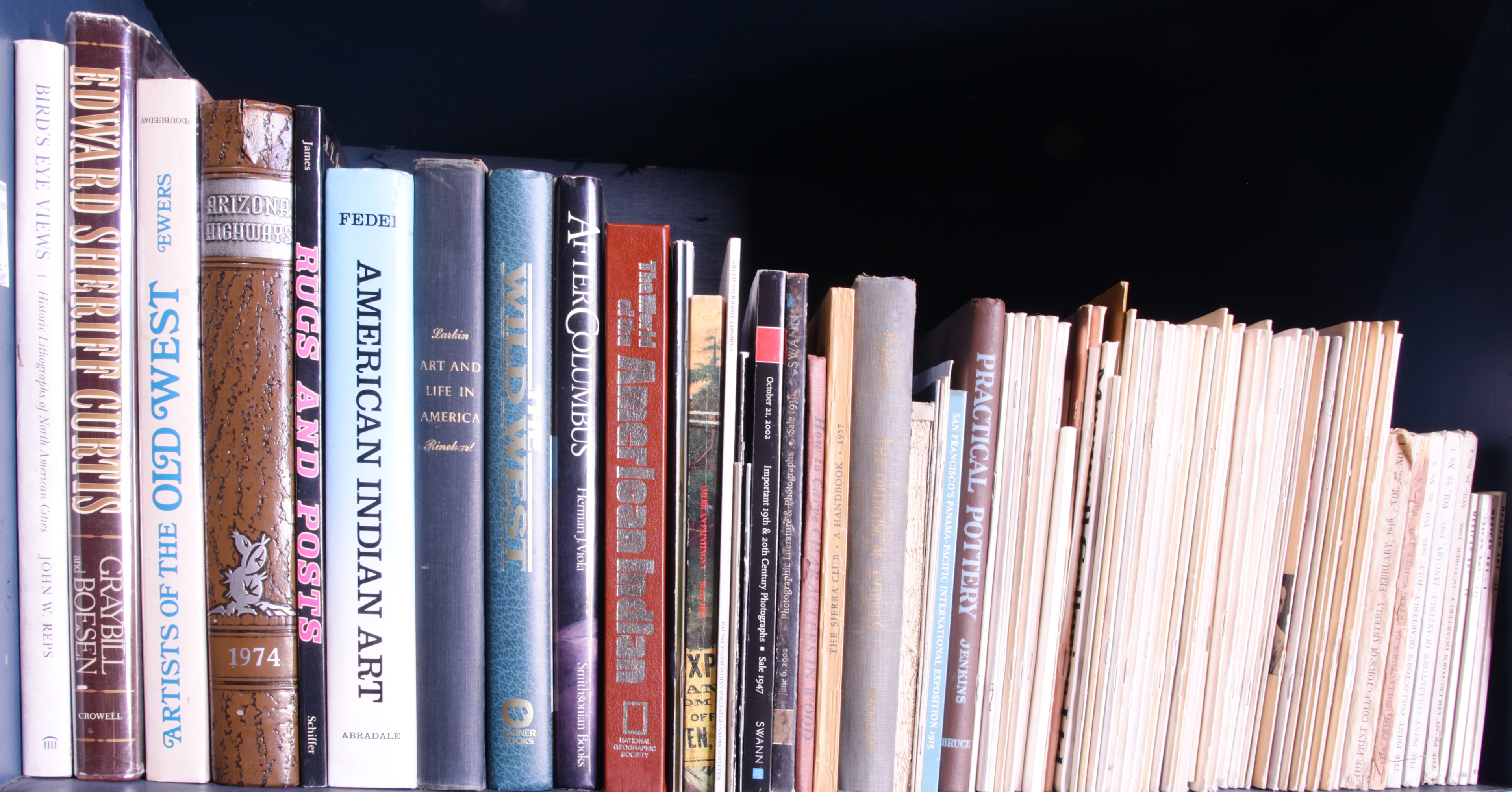 TWO SHELVES OF BOOKS ON NATIVE