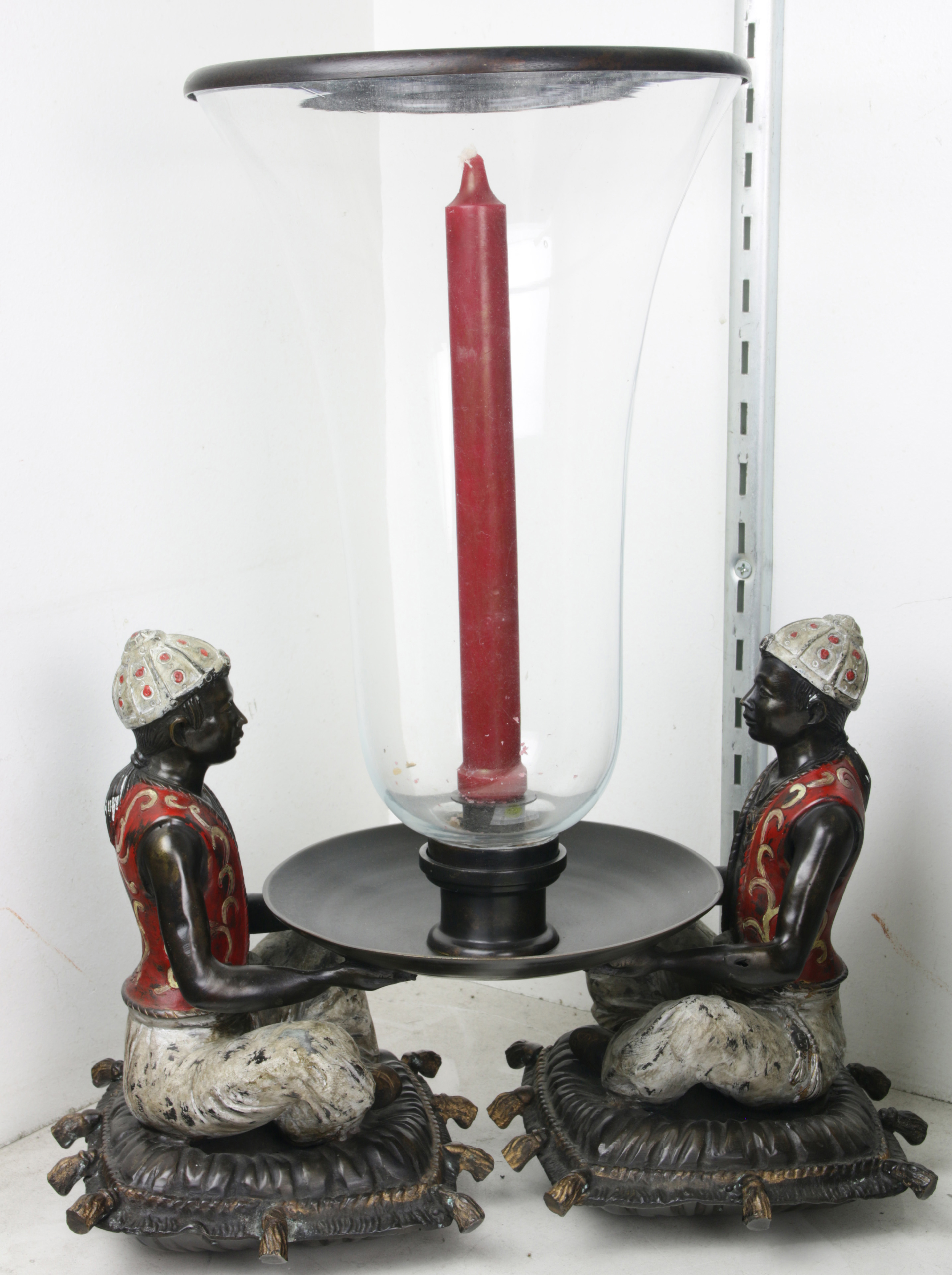 AN ARABESQUE STYLE CANDLE HOLDER