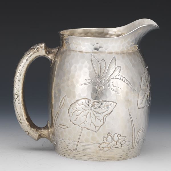 DOMINICK & HAFF HAND HAMMERED PITCHER,