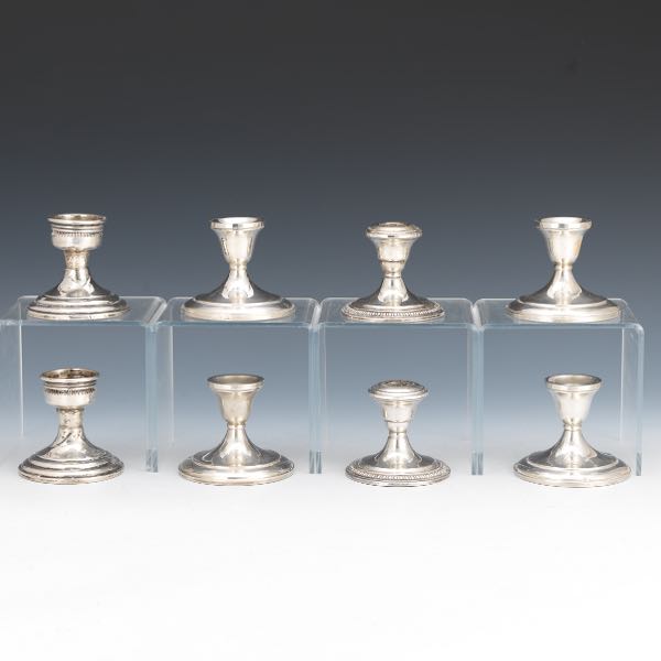 EIGHT STERLING CANDLEHOLDERS 3 ½H