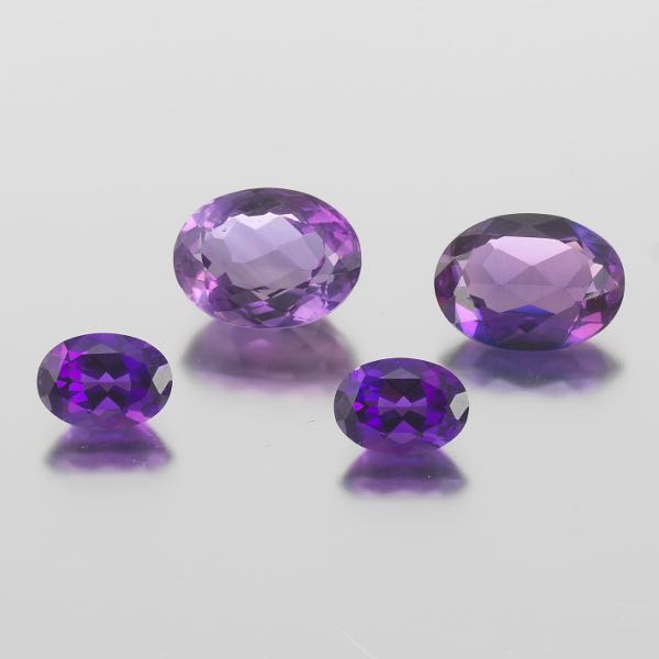 FOUR UNMOUNTED AMETHYSTS, 49.99
