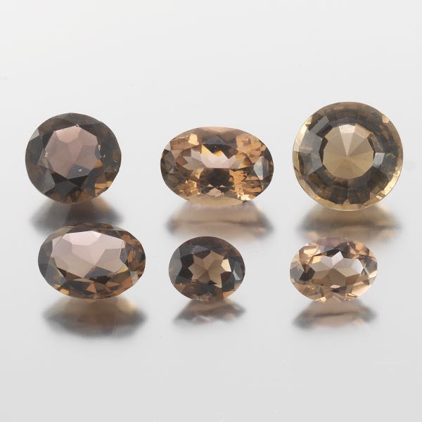 FIVE UNMOUNTED SMOKY QUARTZ GEMSTONES,