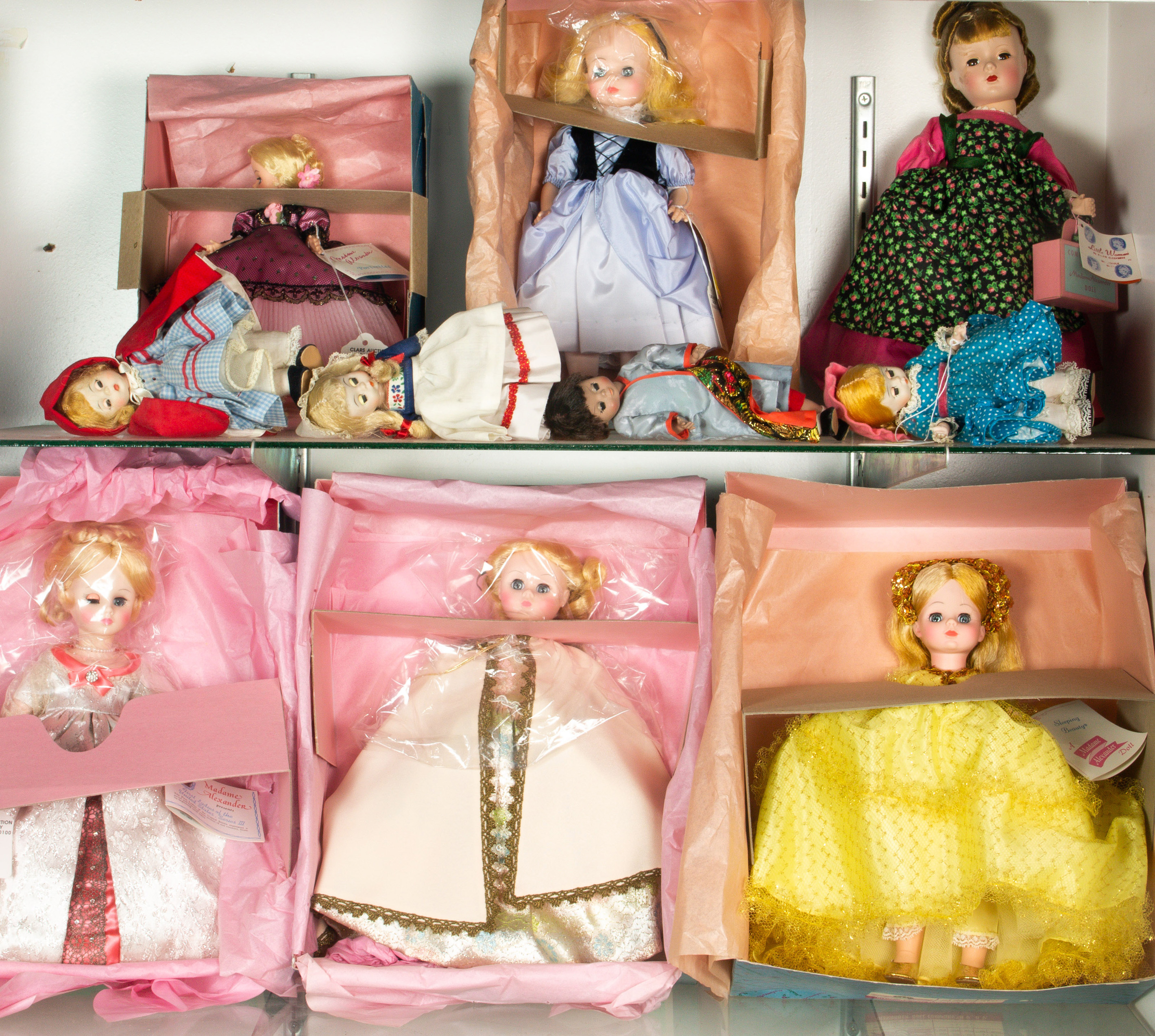 TWO SHELVES OF ASSORTED DOLLS  3a4a08