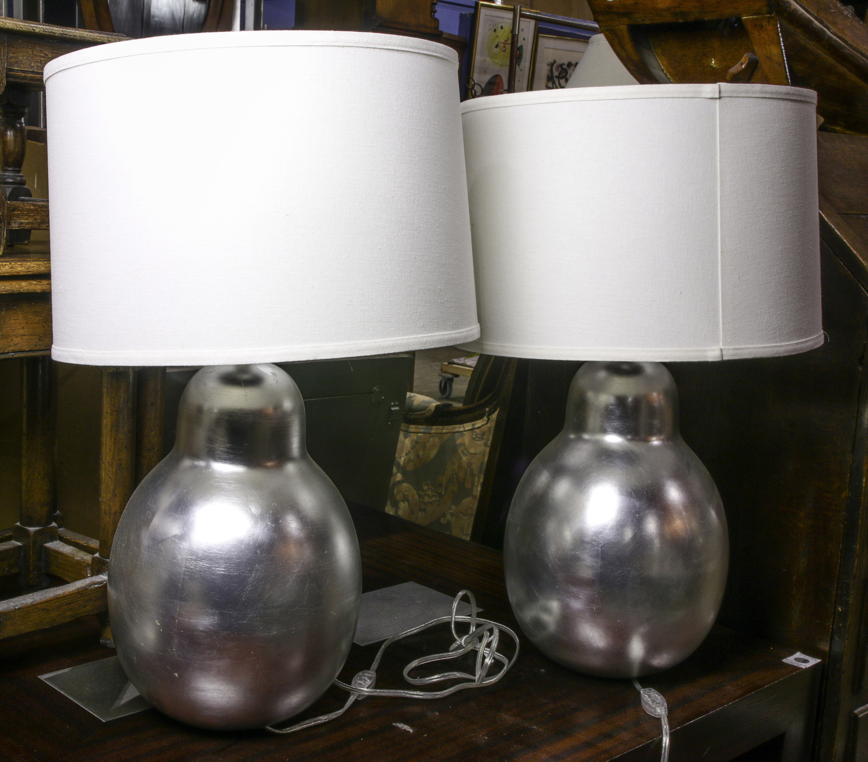 A PAIR OF CONTEMPORARY SILVERED