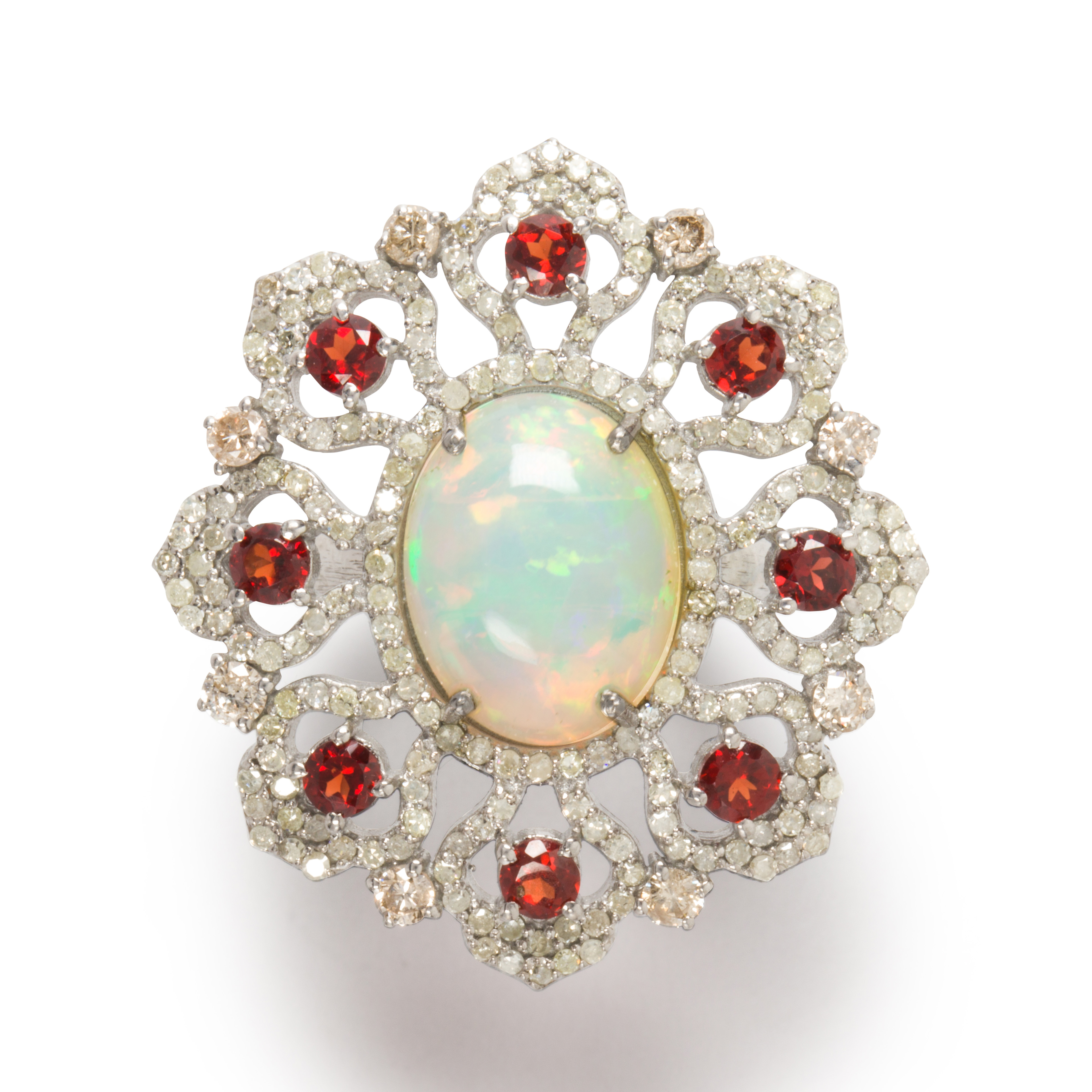 AN OPAL, GARNET AND DIAMOND RING