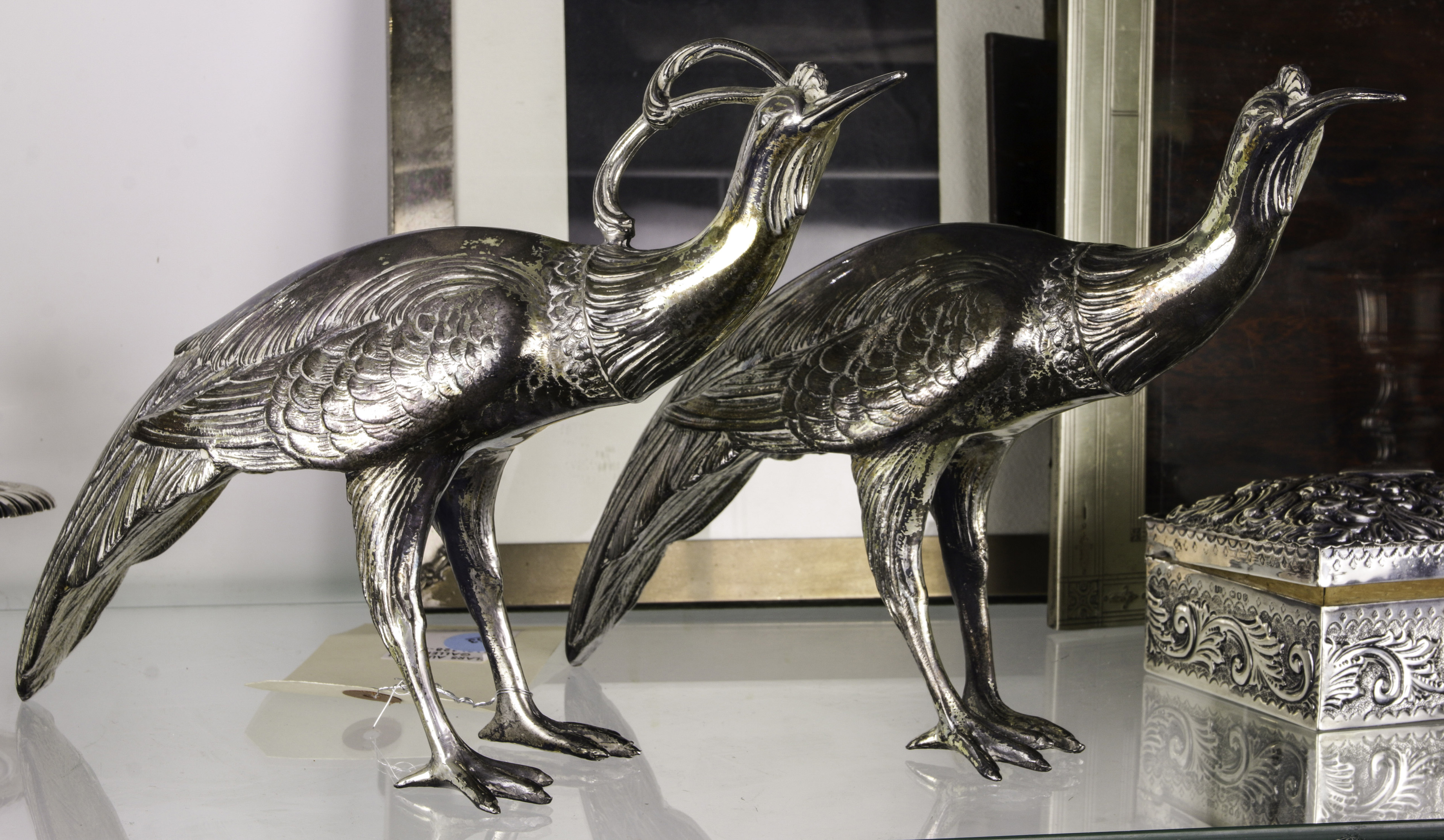 A PAIR OF SILVER PLATED PHEASANTS,