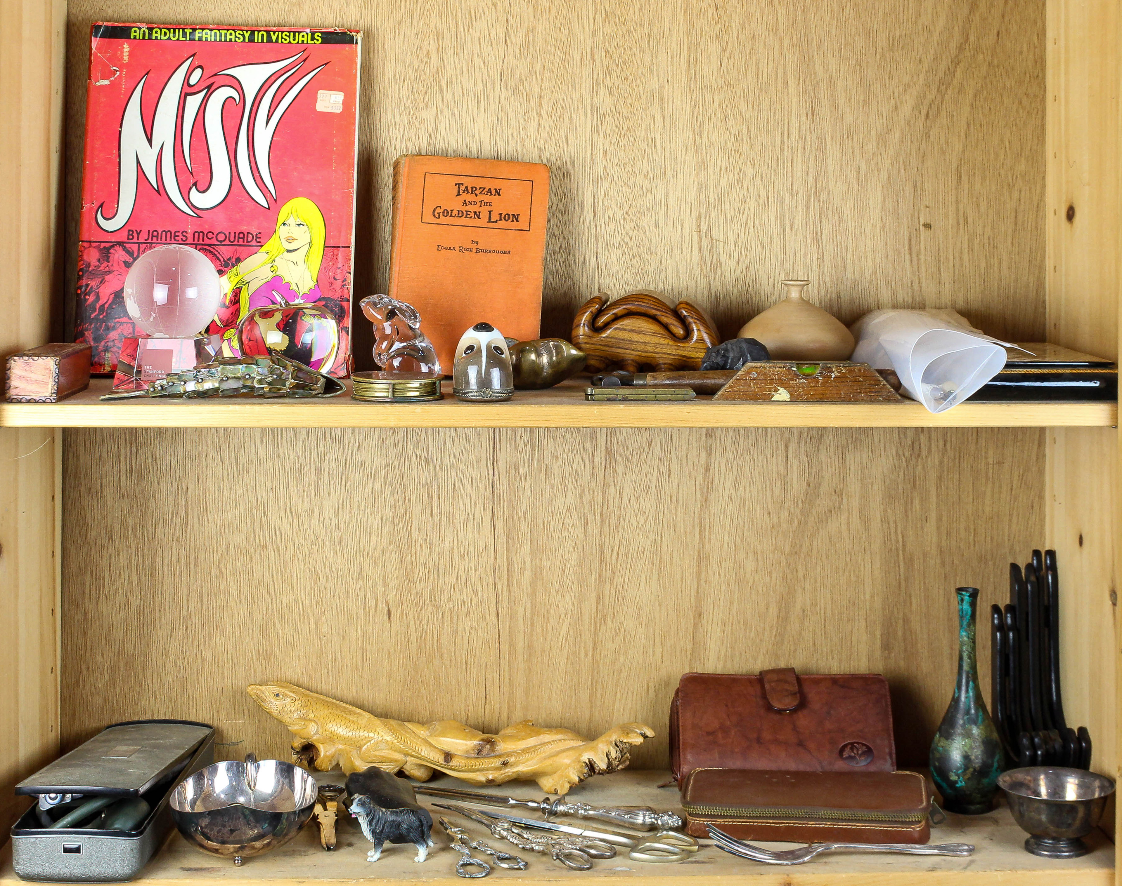 TWO SHELVES OF DECORATIVE ART INCUDING