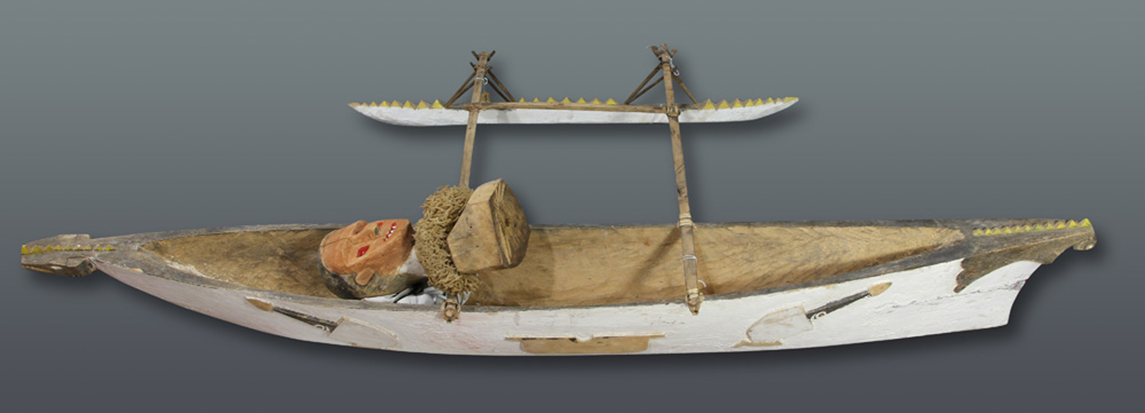 A MODEL OUTRIGGER CANOE USED FOR