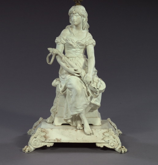 Cast-Spelter Figure of a Seated Bare-Footed